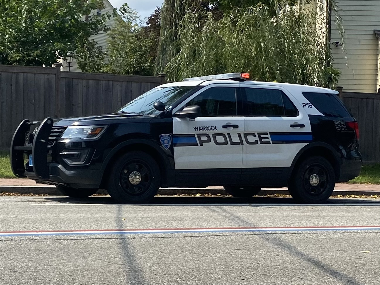 A photo  of Warwick Police
            Cruiser P-19, a 2019 Ford Police Interceptor Utility             taken by @riemergencyvehicles