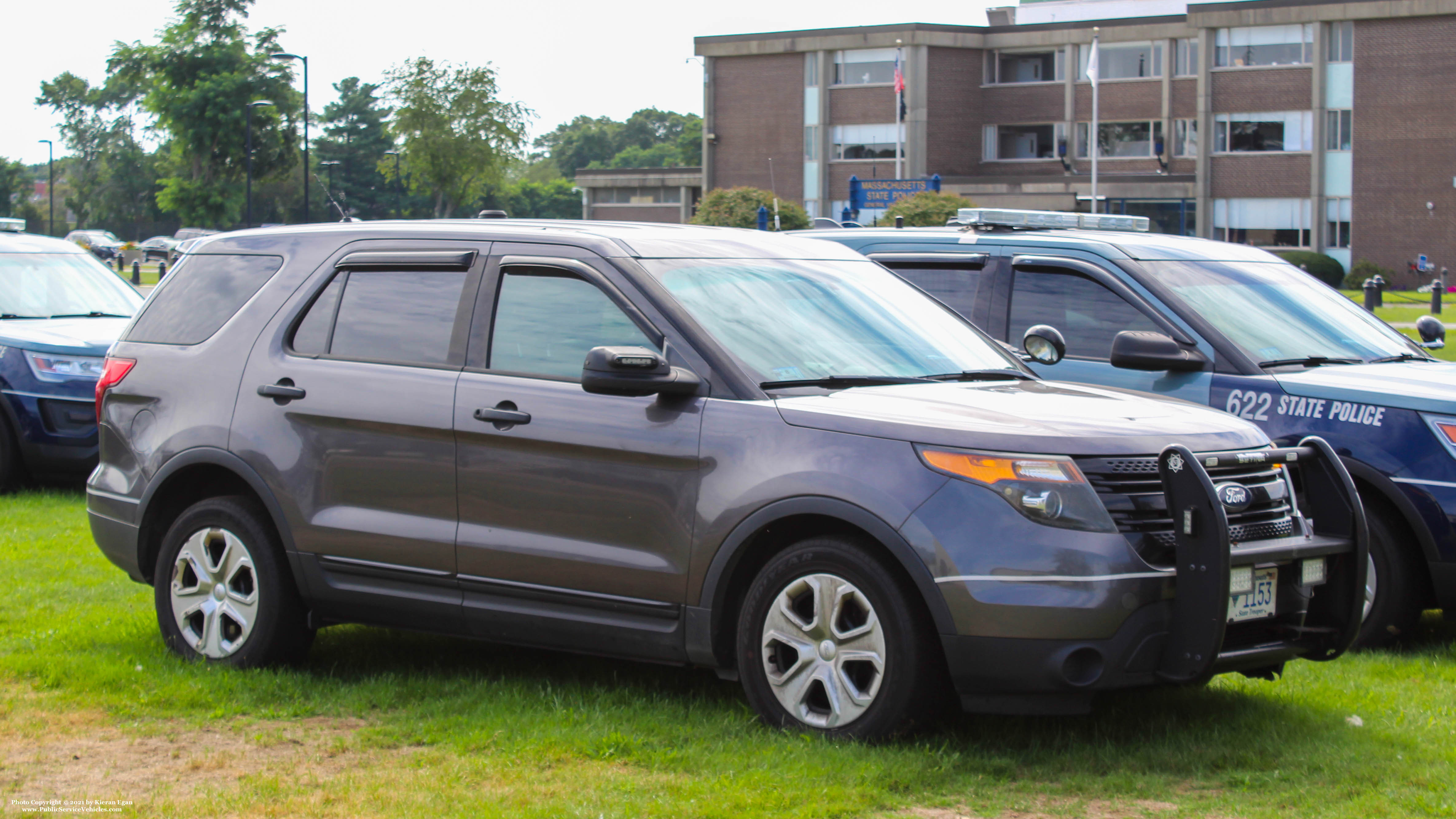 A photo  of Massachusetts State Police
            Cruiser 1153, a 2014 Ford Police Interceptor Utility             taken by Kieran Egan