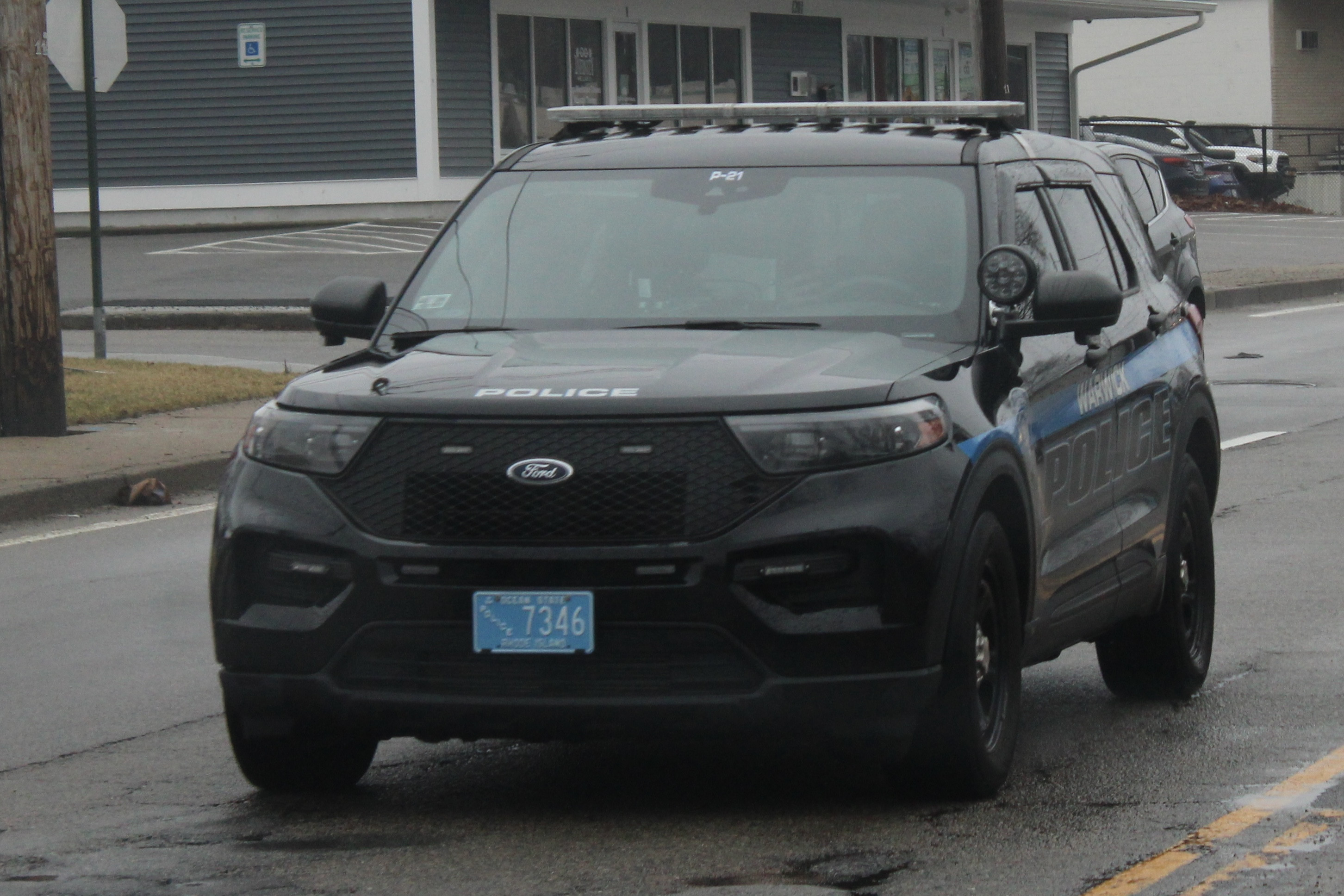 A photo  of Warwick Police
            Cruiser P-21, a 2021 Ford Police Interceptor Utility             taken by @riemergencyvehicles