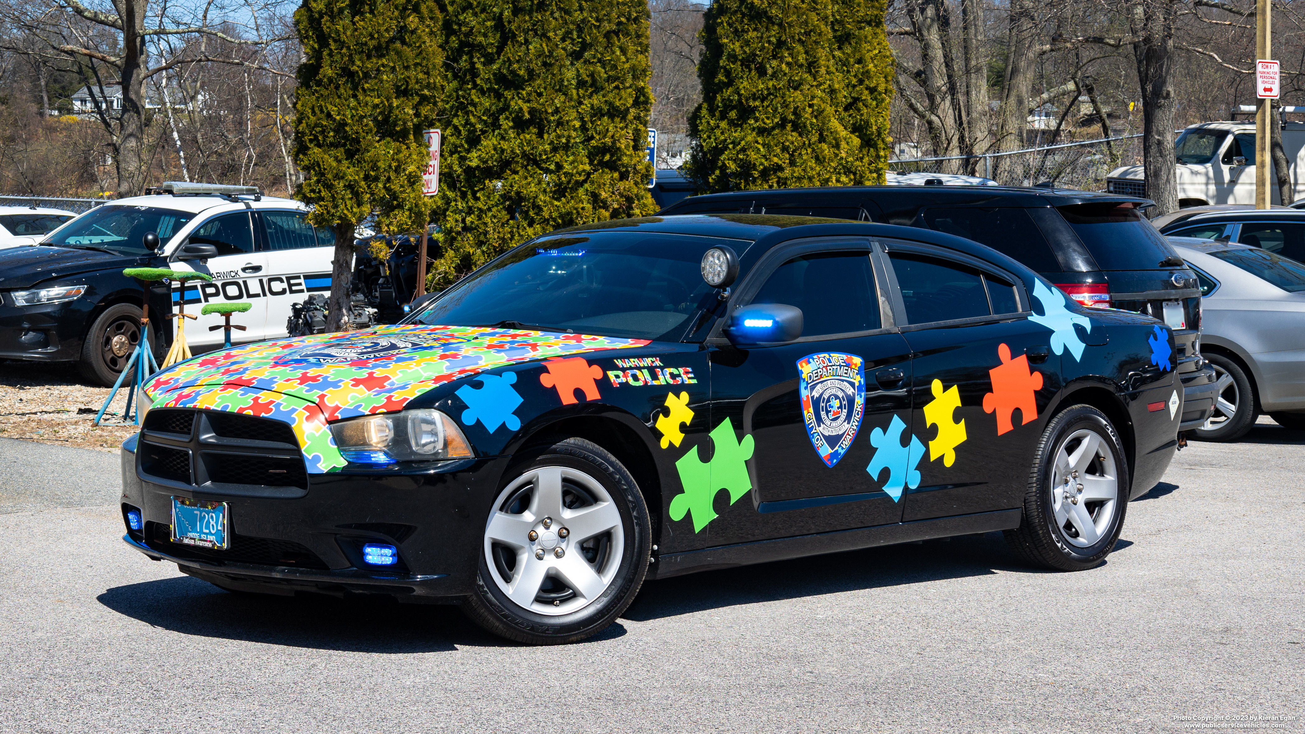 A photo  of Warwick Police
            Autism Awareness Unit, a 2011 Dodge Charger             taken by Kieran Egan