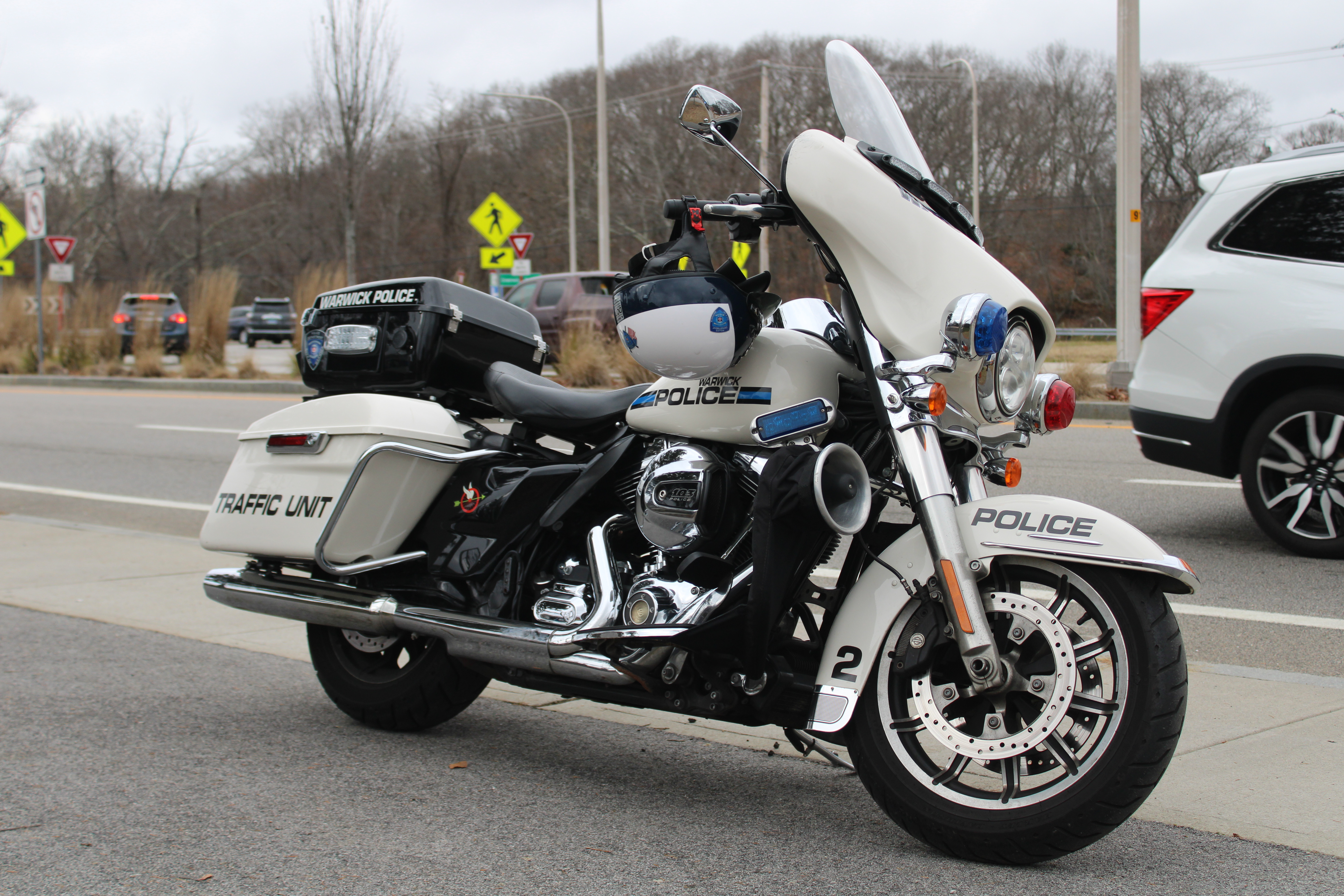 A photo  of Warwick Police
            Motorcycle 2, a 2010-2015 Harley Davidson Electra Glide             taken by @riemergencyvehicles