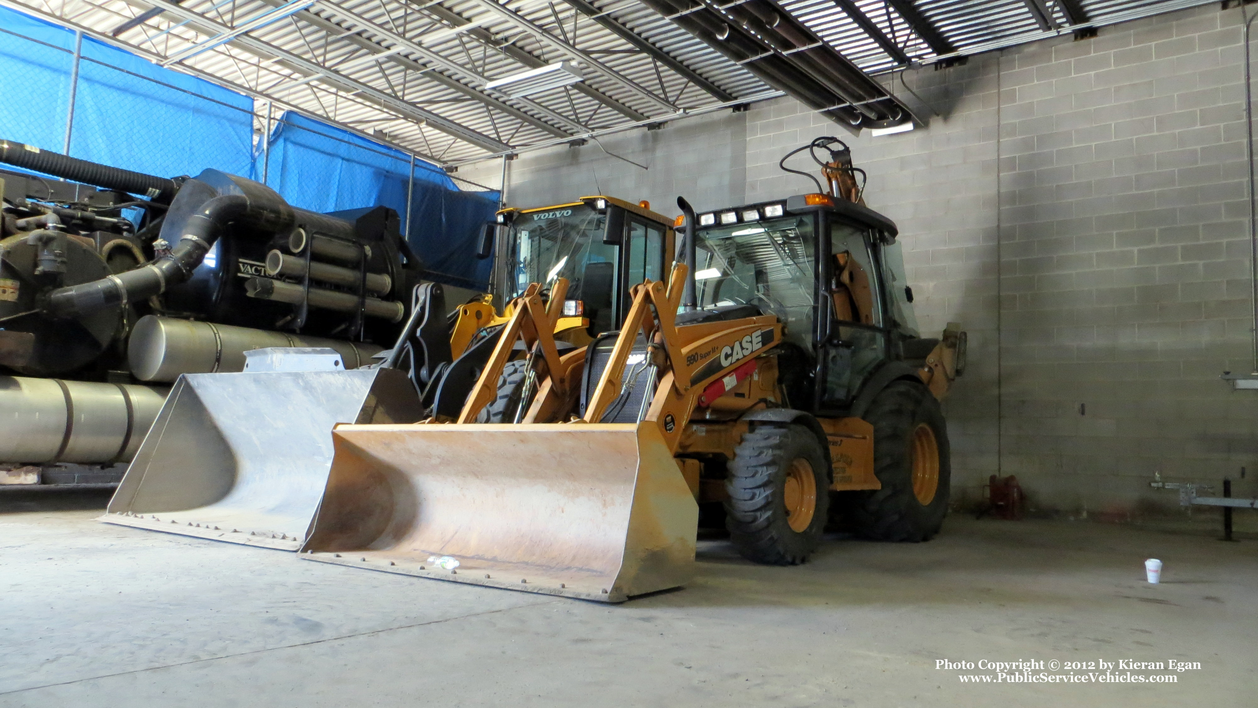 A photo  of Walpole Water Department
            Backhoe 450, a 2009 CASE 490M             taken by Kieran Egan