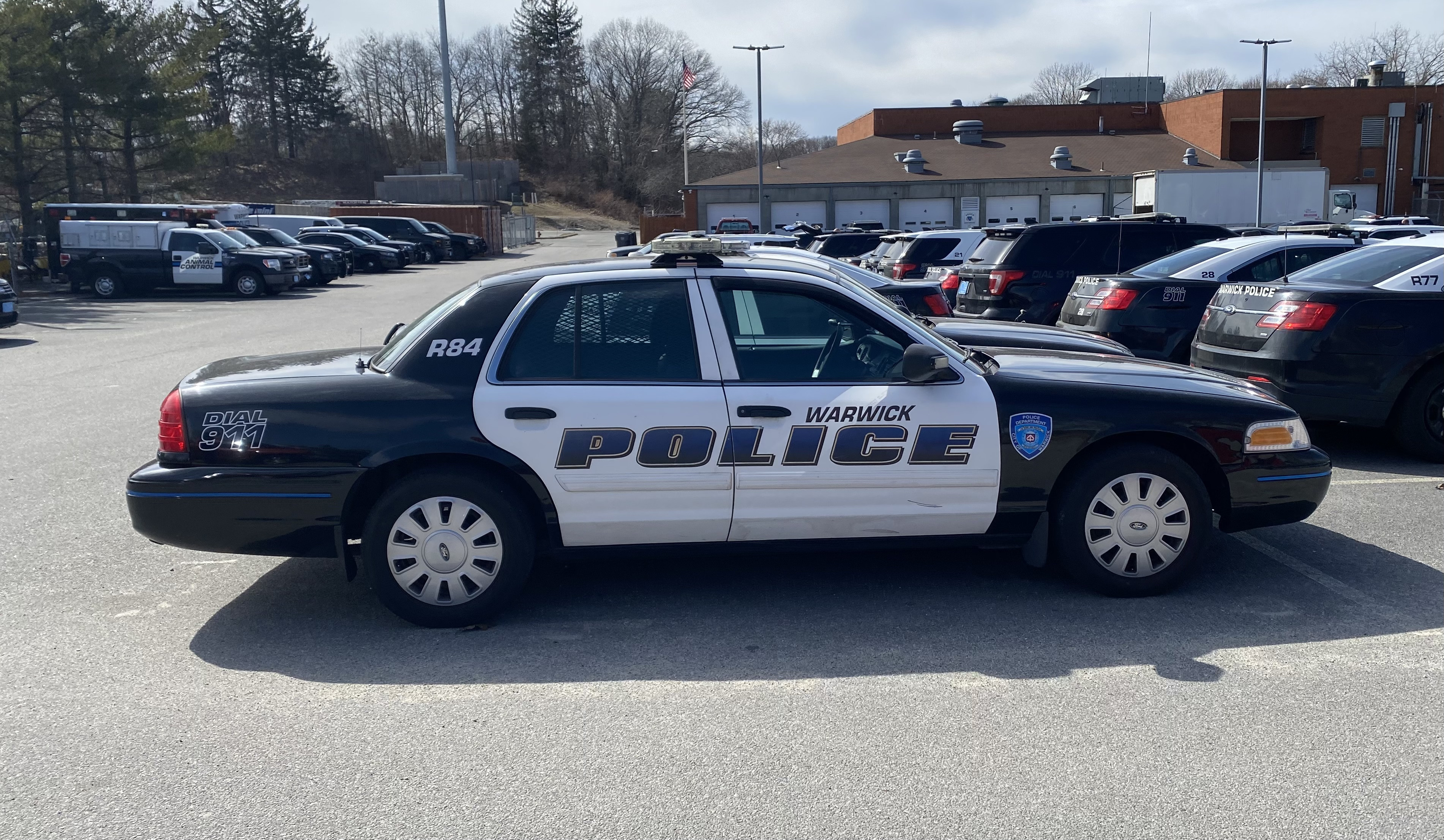 A photo  of Warwick Police
            Cruiser R-84, a 2011 Ford Crown Victoria Police Interceptor             taken by @riemergencyvehicles