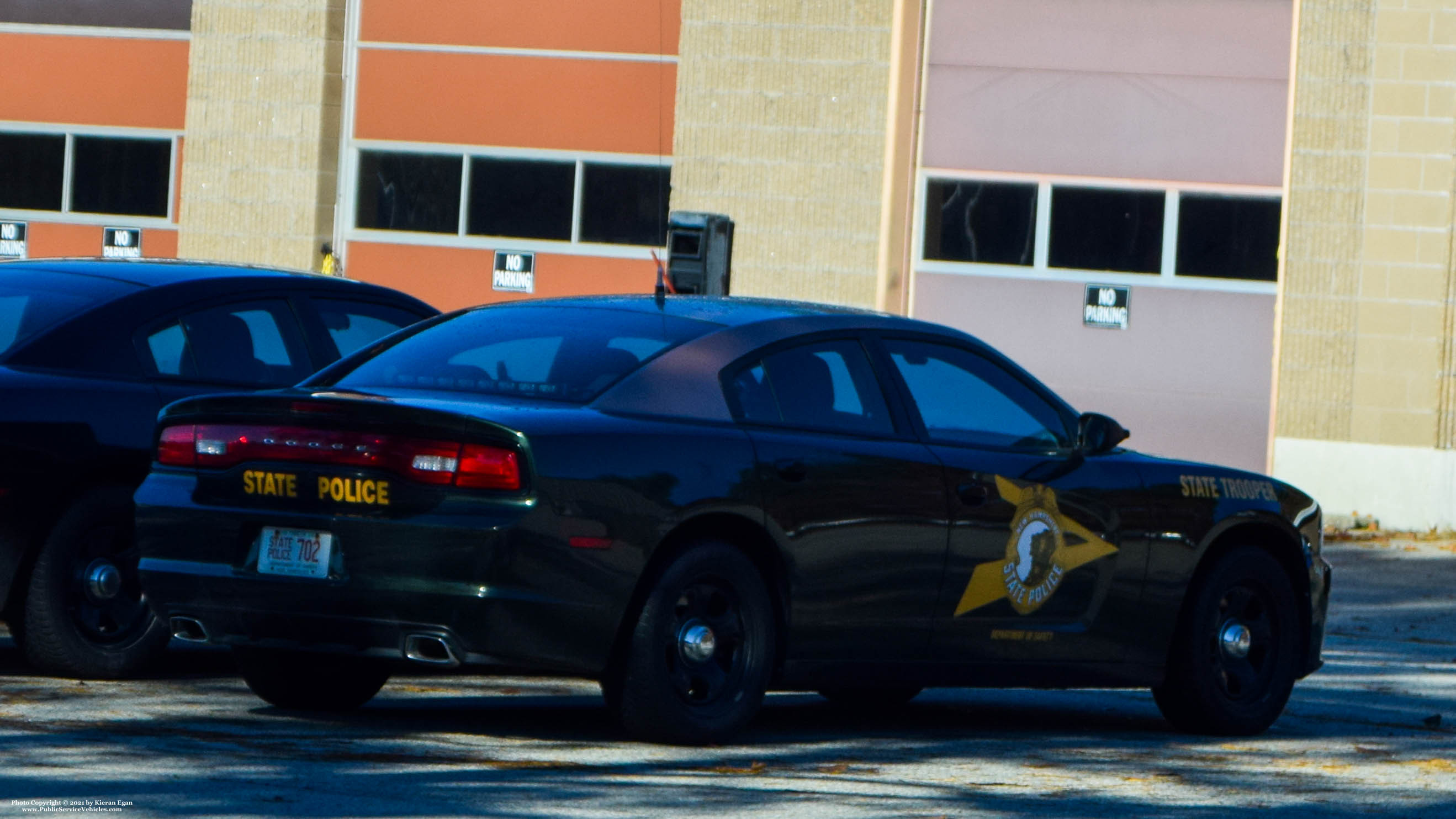 A photo  of New Hampshire State Police
            Cruiser 702, a 2011-2014 Dodge Charger             taken by Kieran Egan