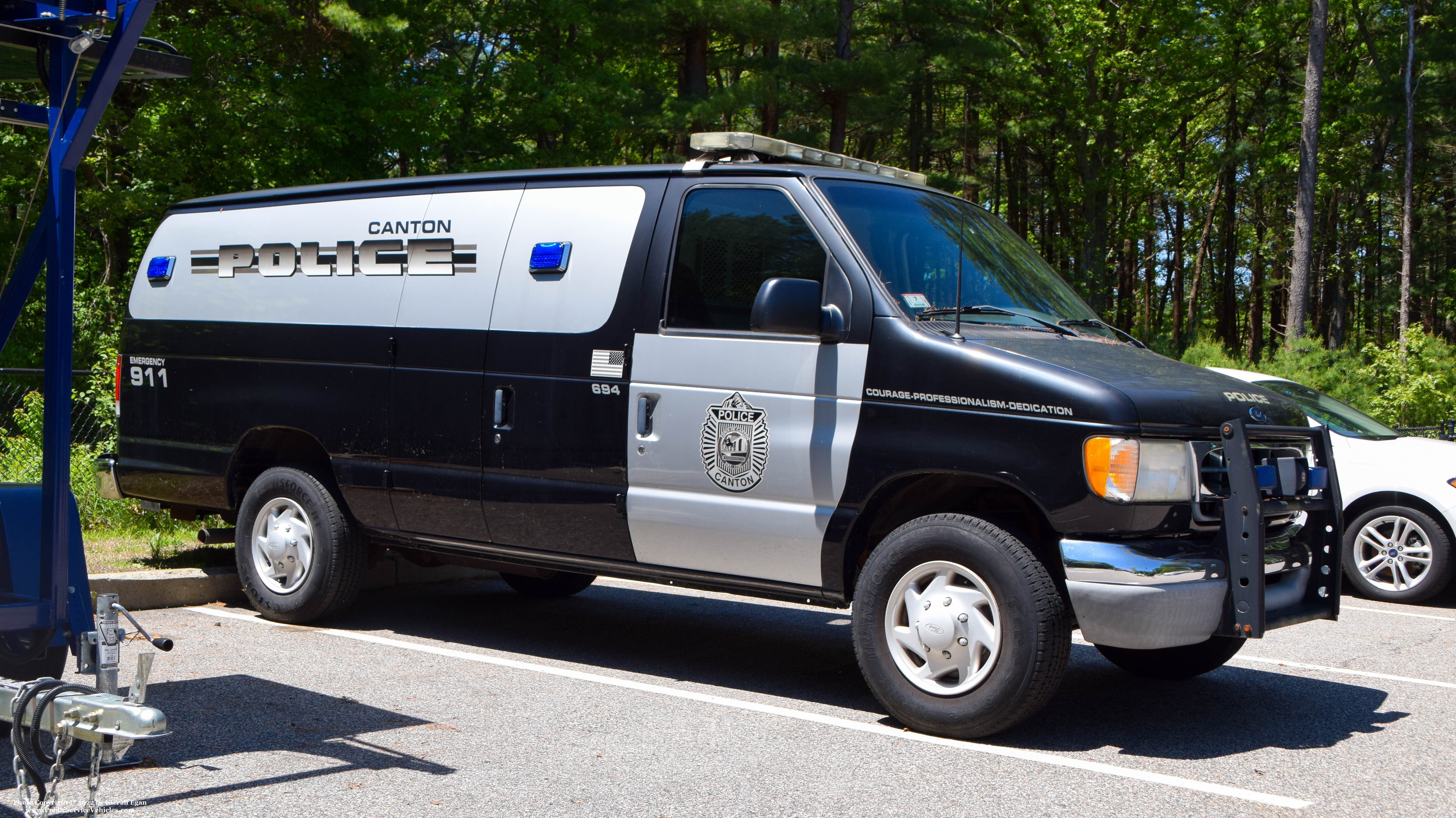 A photo  of Canton Police
            Cruiser 694, a 2001 Ford Econoline             taken by Kieran Egan