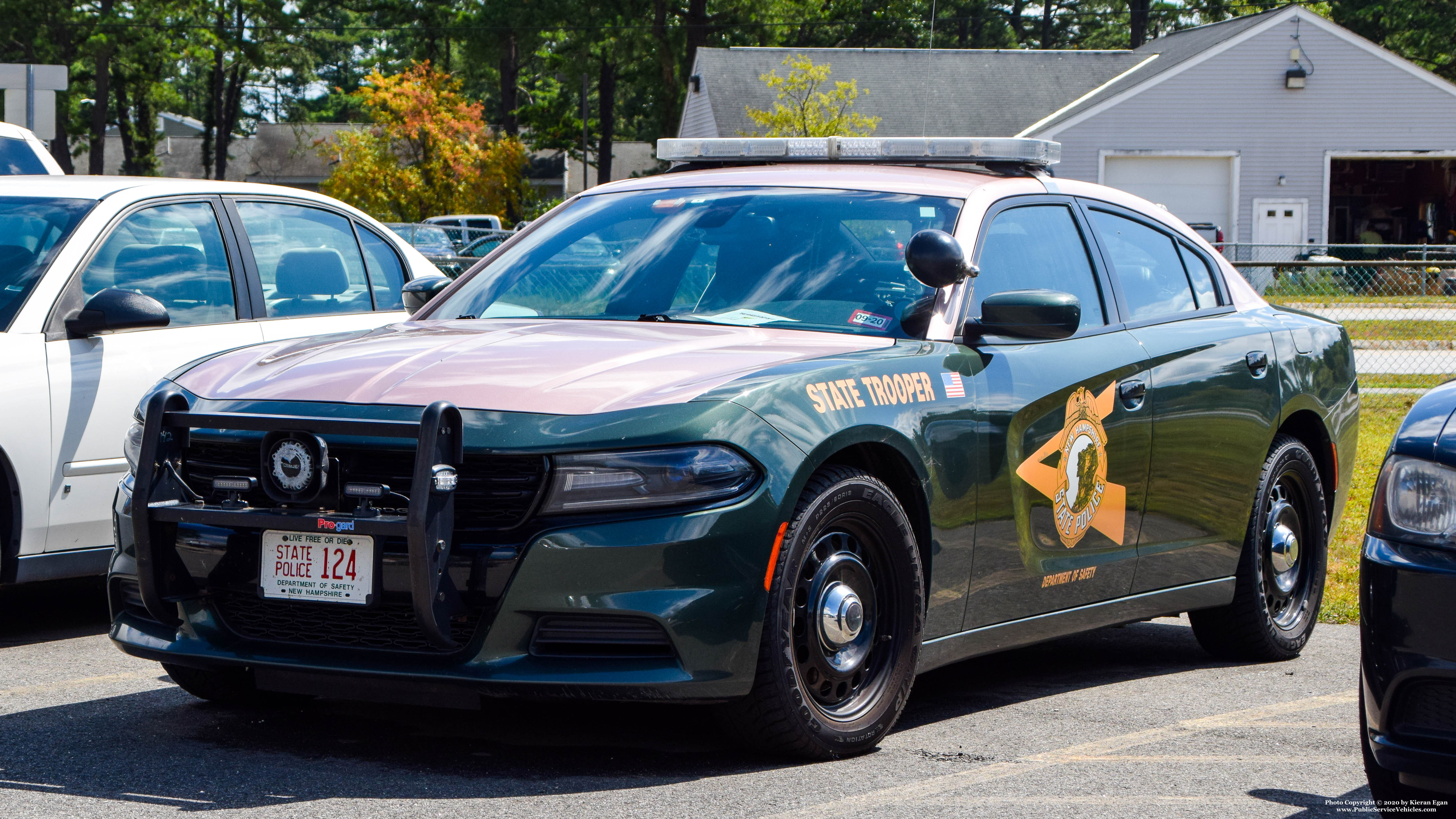 A photo  of New Hampshire State Police
            Cruiser 124, a 2015-2019 Dodge Charger             taken by Kieran Egan