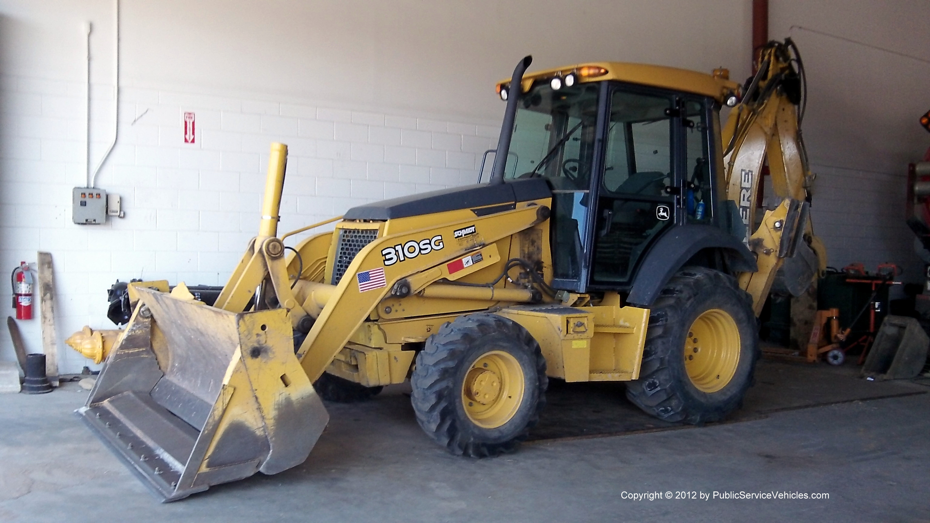 A photo  of East Providence Water Utilities Division
            Backhoe 2144, a 1990-2010 John Deere 310SG             taken by Kieran Egan