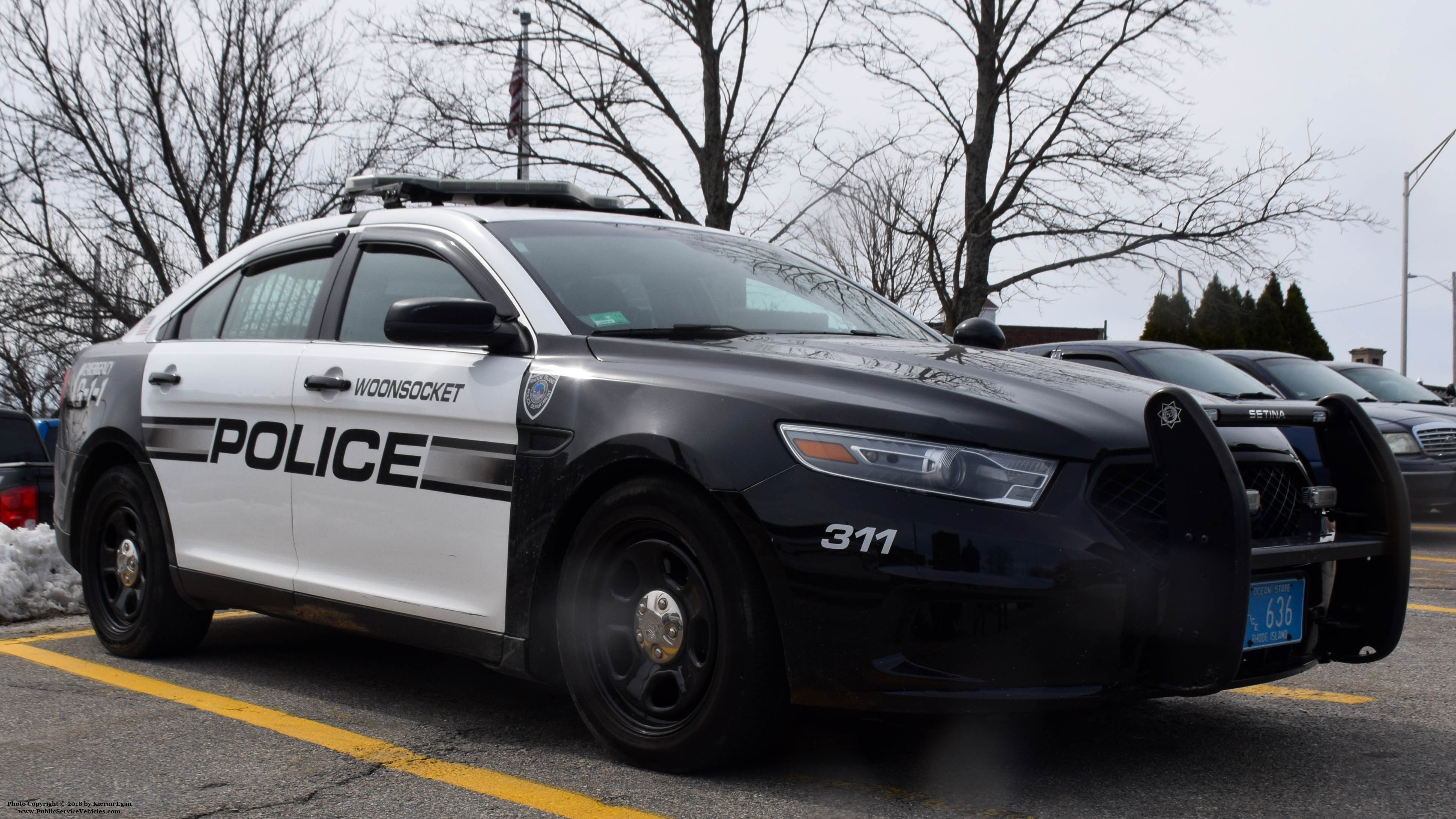 A photo  of Woonsocket Police
            Cruiser 311, a 2014-2018 Ford Police Interceptor Sedan             taken by Kieran Egan