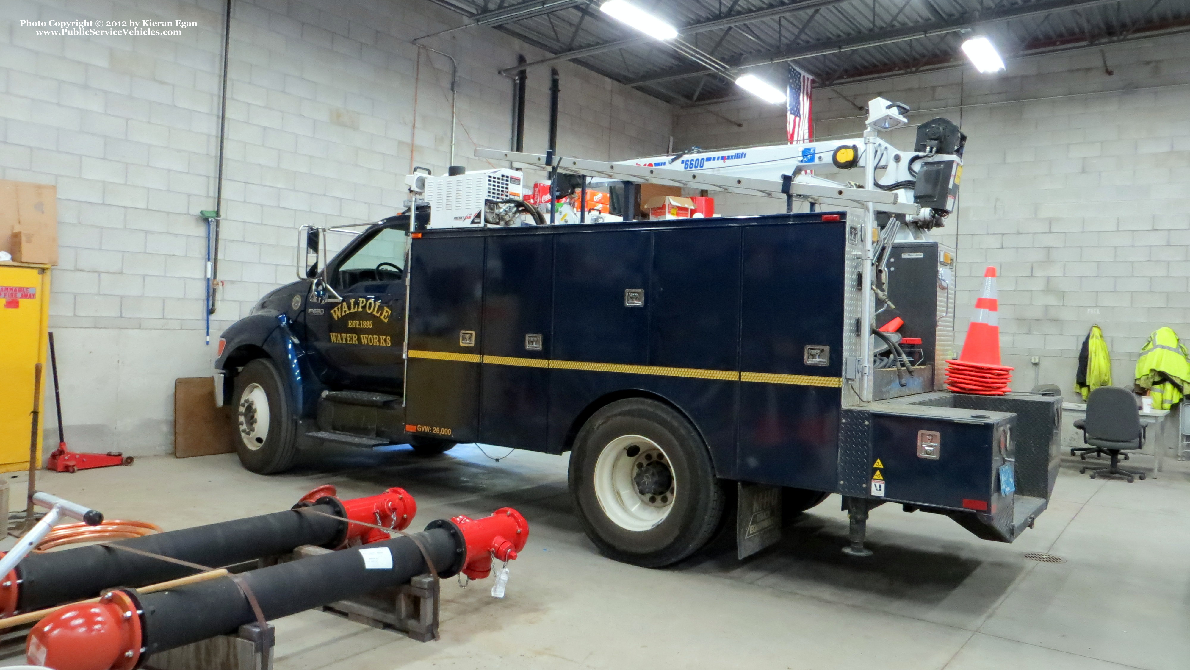 A photo  of Walpole Water Department
            Truck 404, a 2009 Ford F-650/Omaha             taken by Kieran Egan