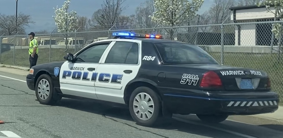 A photo  of Warwick Police
            Cruiser R-84, a 2011 Ford Crown Victoria Police Interceptor             taken by @riemergencyvehicles