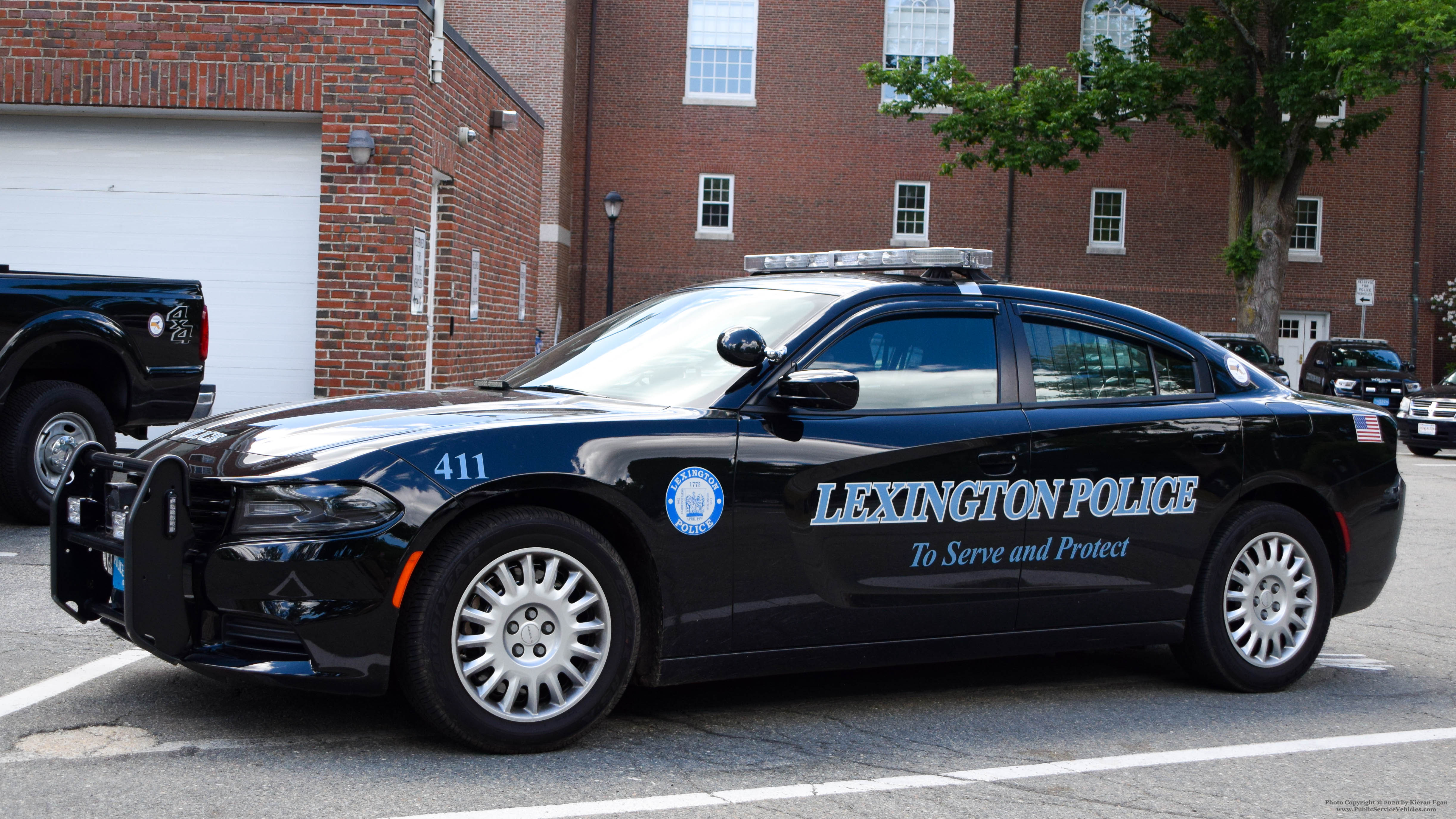 A photo  of Lexington Police
            Cruiser 411, a 2019 Dodge Charger/Whelen Liberty II/Setina Push Bumper             taken by Kieran Egan