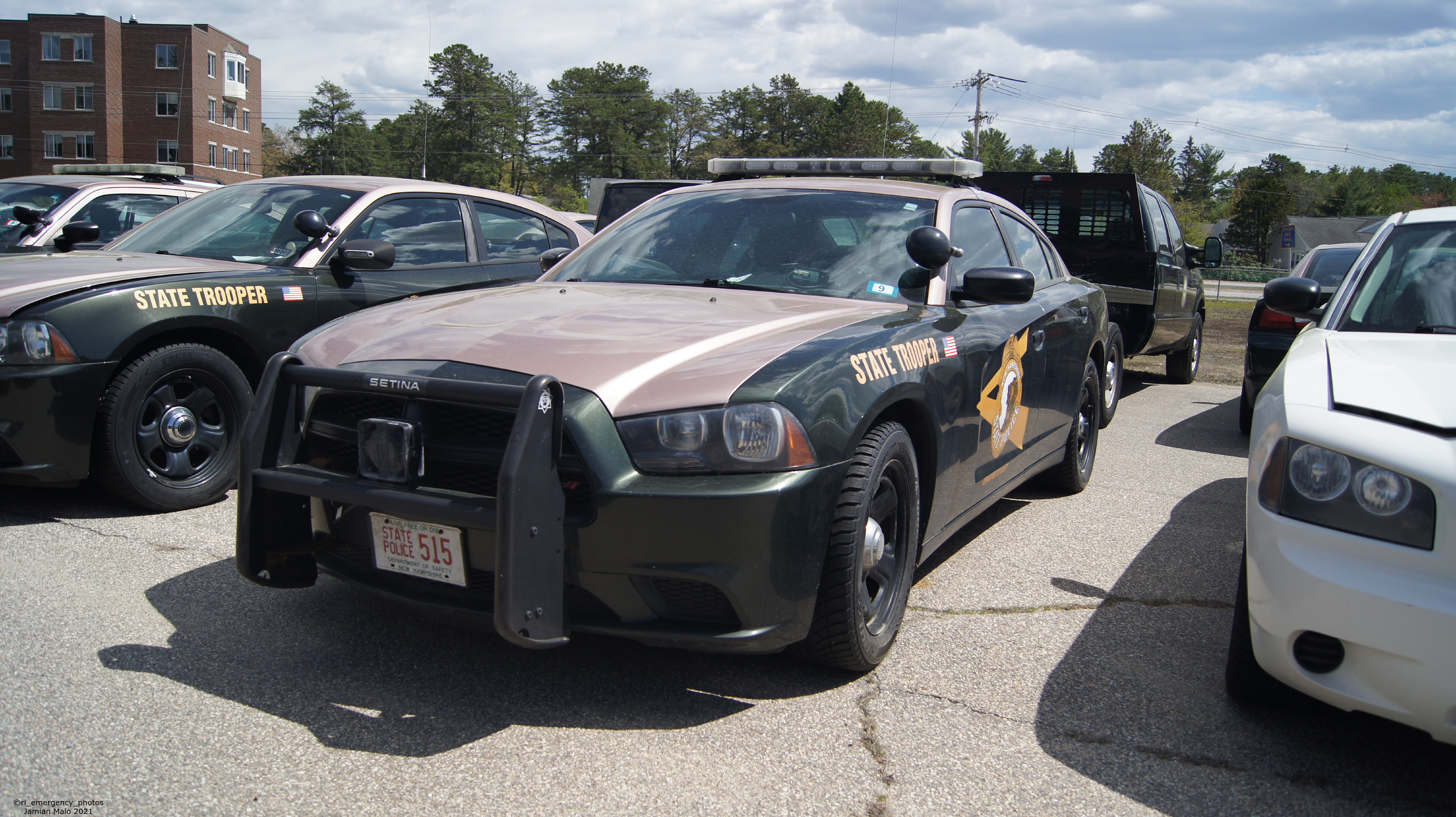 A photo  of New Hampshire State Police
            Cruiser 515, a 2011-2014 Dodge Charger             taken by Jamian Malo