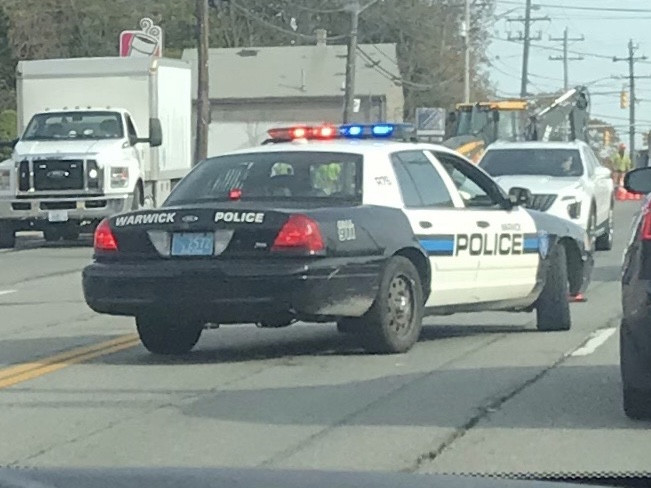 A photo  of Warwick Police
            Cruiser R-76, a 2009-2011 Ford Crown Victoria Police Interceptor             taken by @riemergencyvehicles