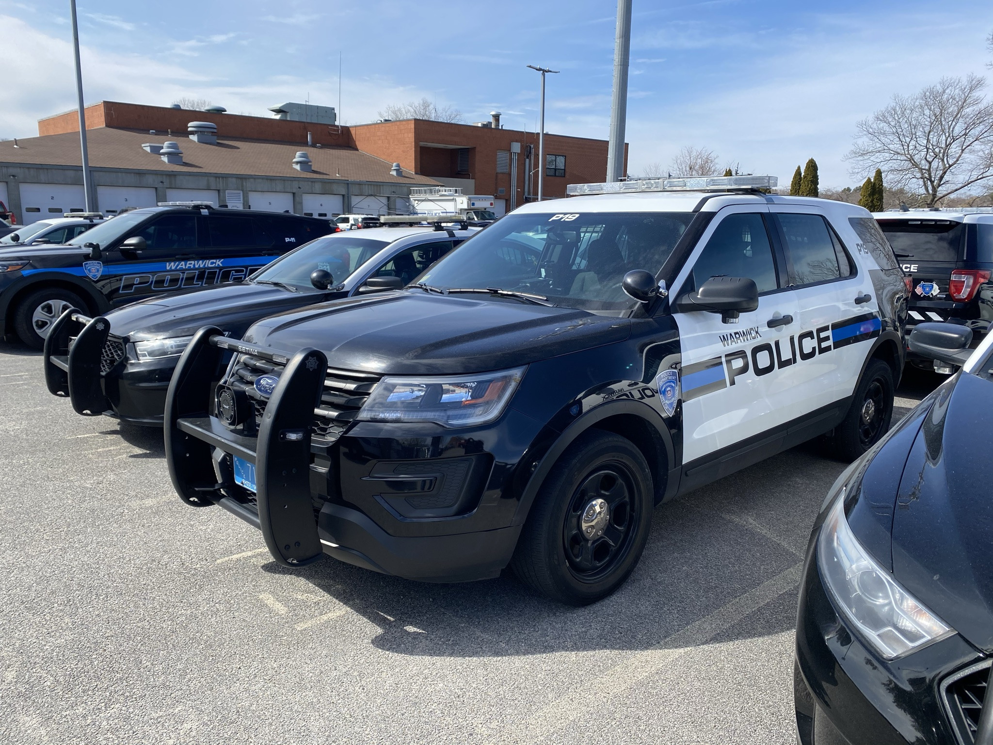 A photo  of Warwick Police
            Cruiser P-19, a 2019 Ford Police Interceptor Utility             taken by @riemergencyvehicles