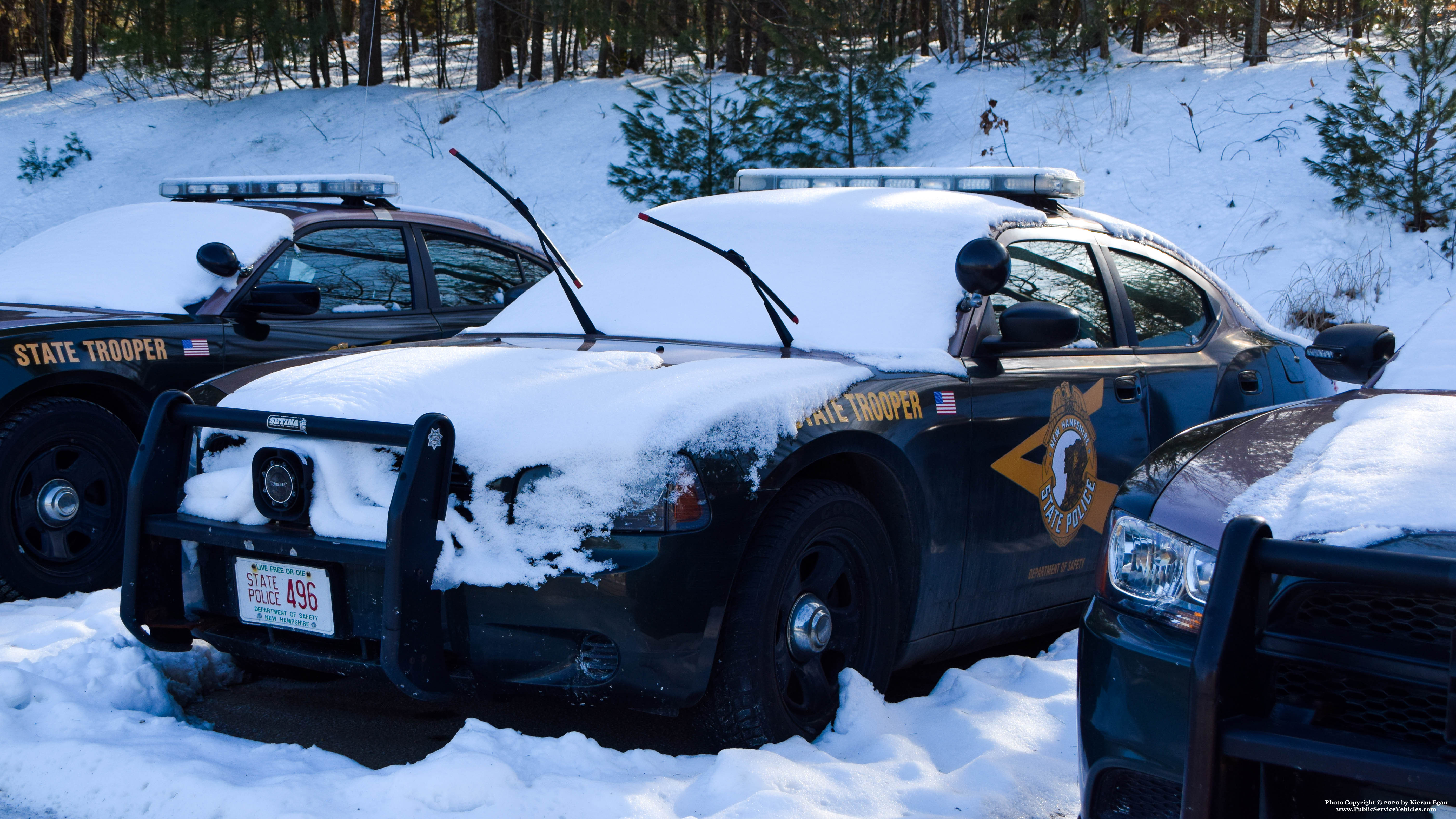 A photo  of New Hampshire State Police
            Cruiser 496, a 2006-2010 Dodge Charger             taken by Kieran Egan