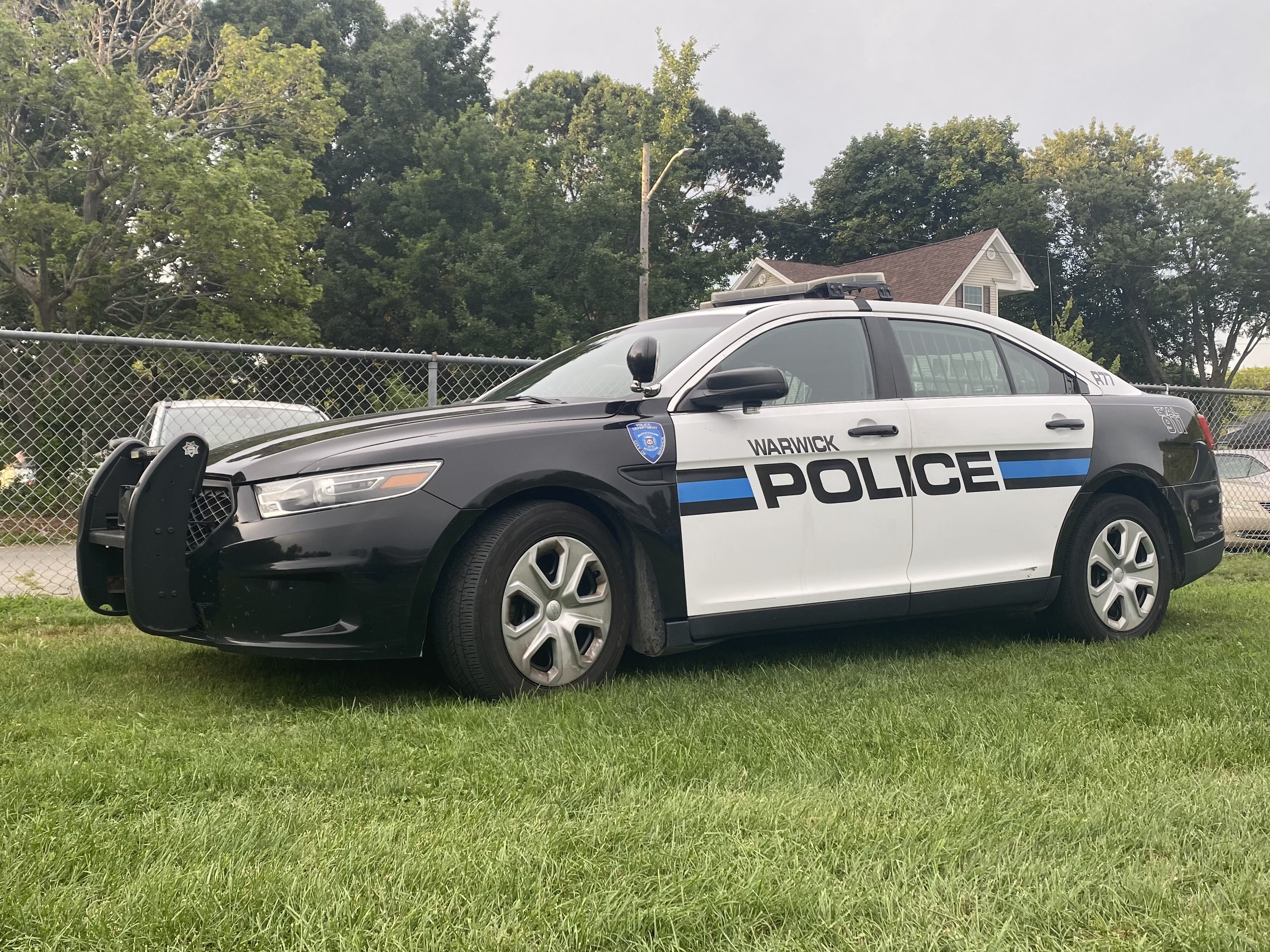 A photo  of Warwick Police
            Cruiser R-77, a 2015 Ford Police Interceptor Sedan             taken by @riemergencyvehicles