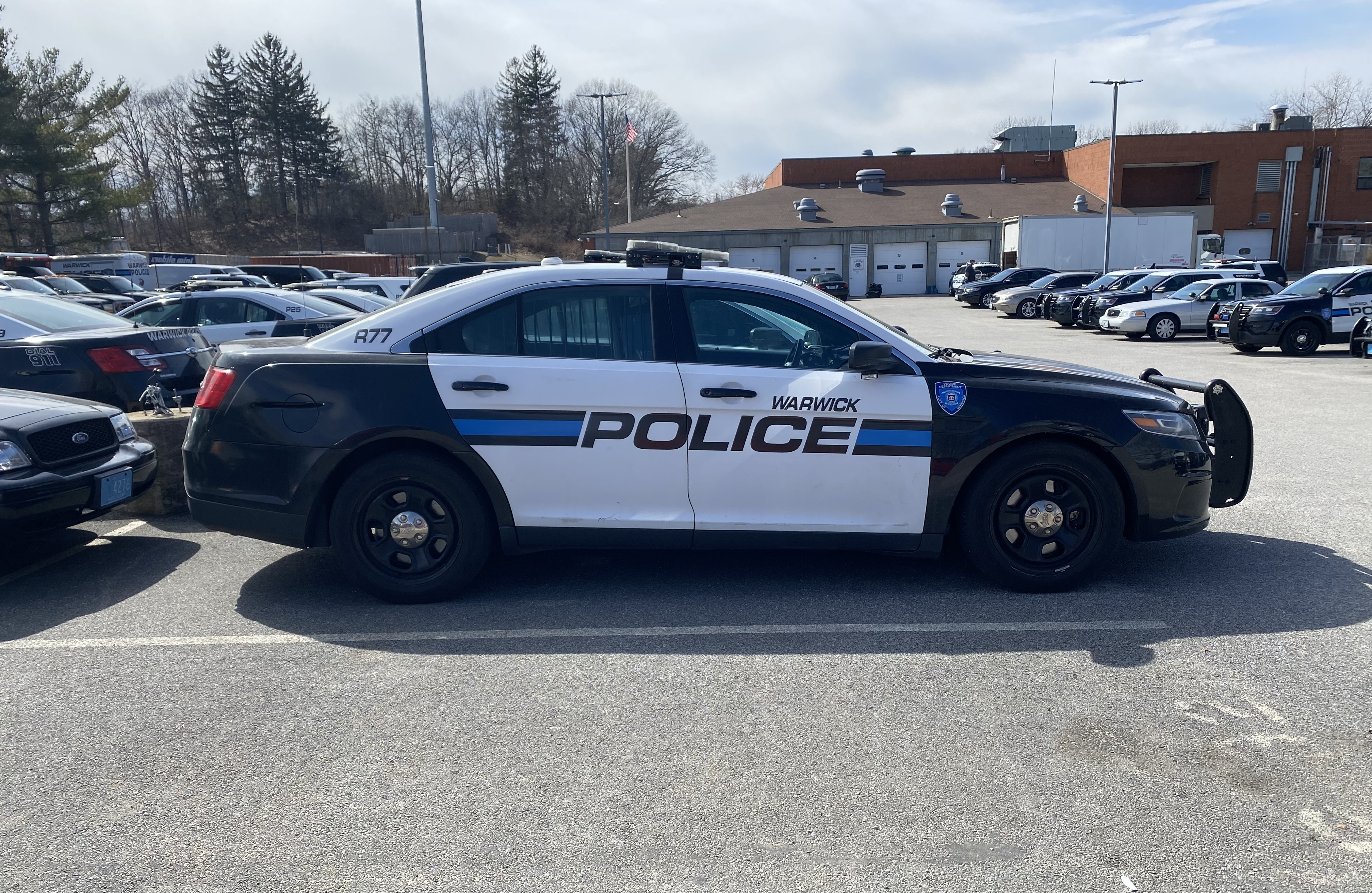 A photo  of Warwick Police
            Cruiser R-77, a 2015 Ford Police Interceptor Sedan             taken by @riemergencyvehicles