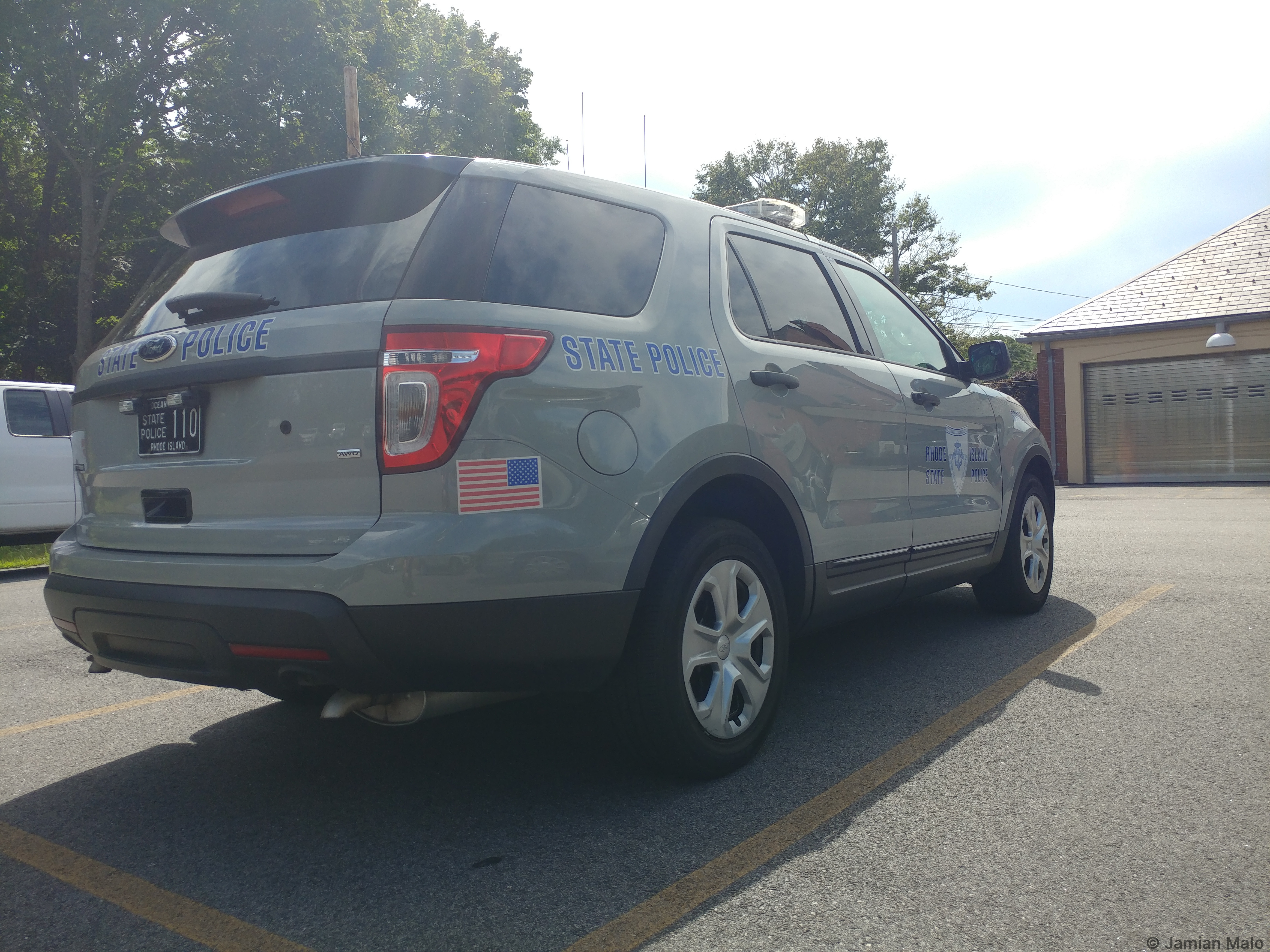 A photo  of Rhode Island State Police
            Cruiser 110, a 2013-2015 Ford Police Interceptor Utility             taken by Jamian Malo
