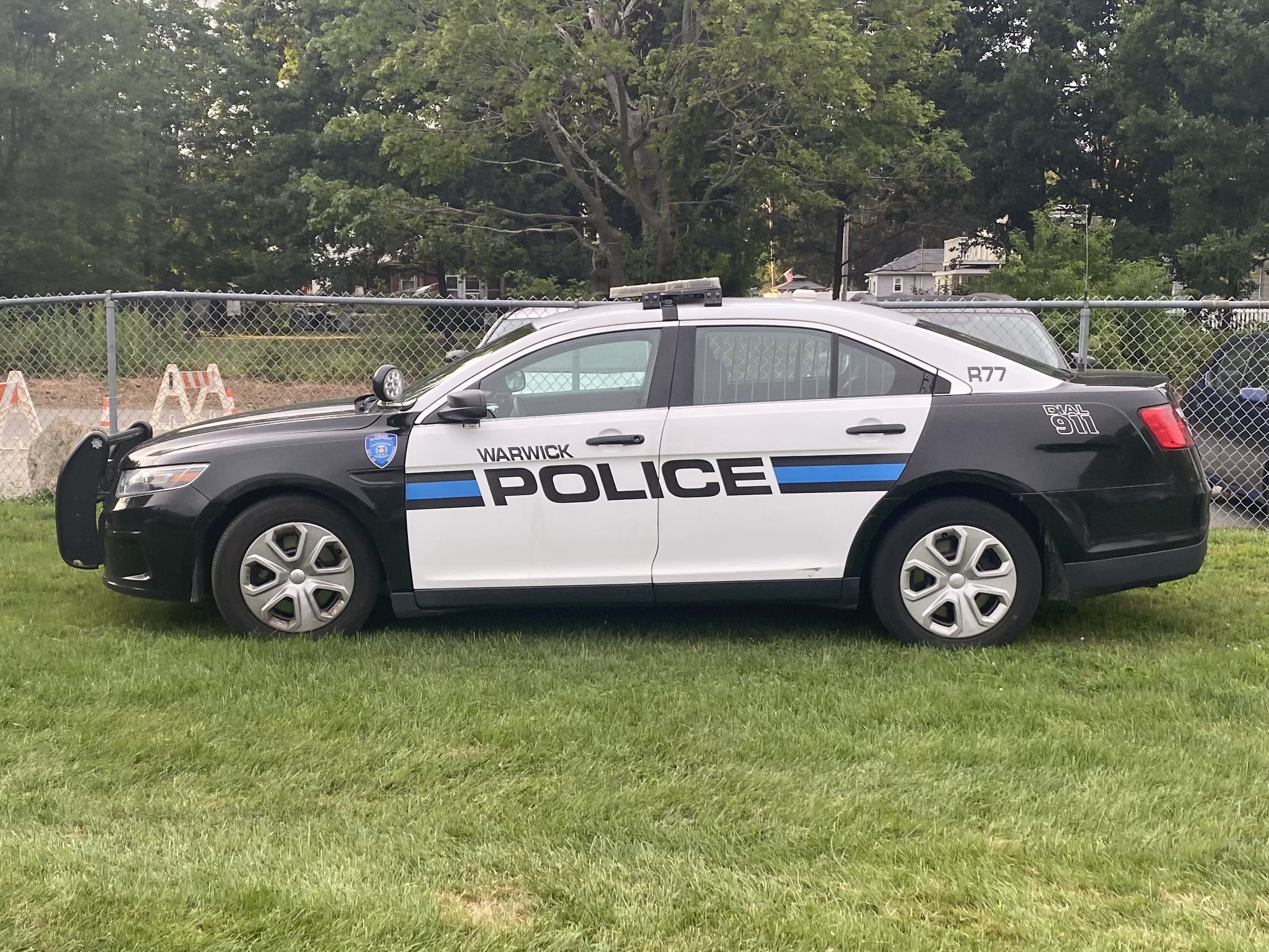 A photo  of Warwick Police
            Cruiser R-77, a 2015 Ford Police Interceptor Sedan             taken by @riemergencyvehicles