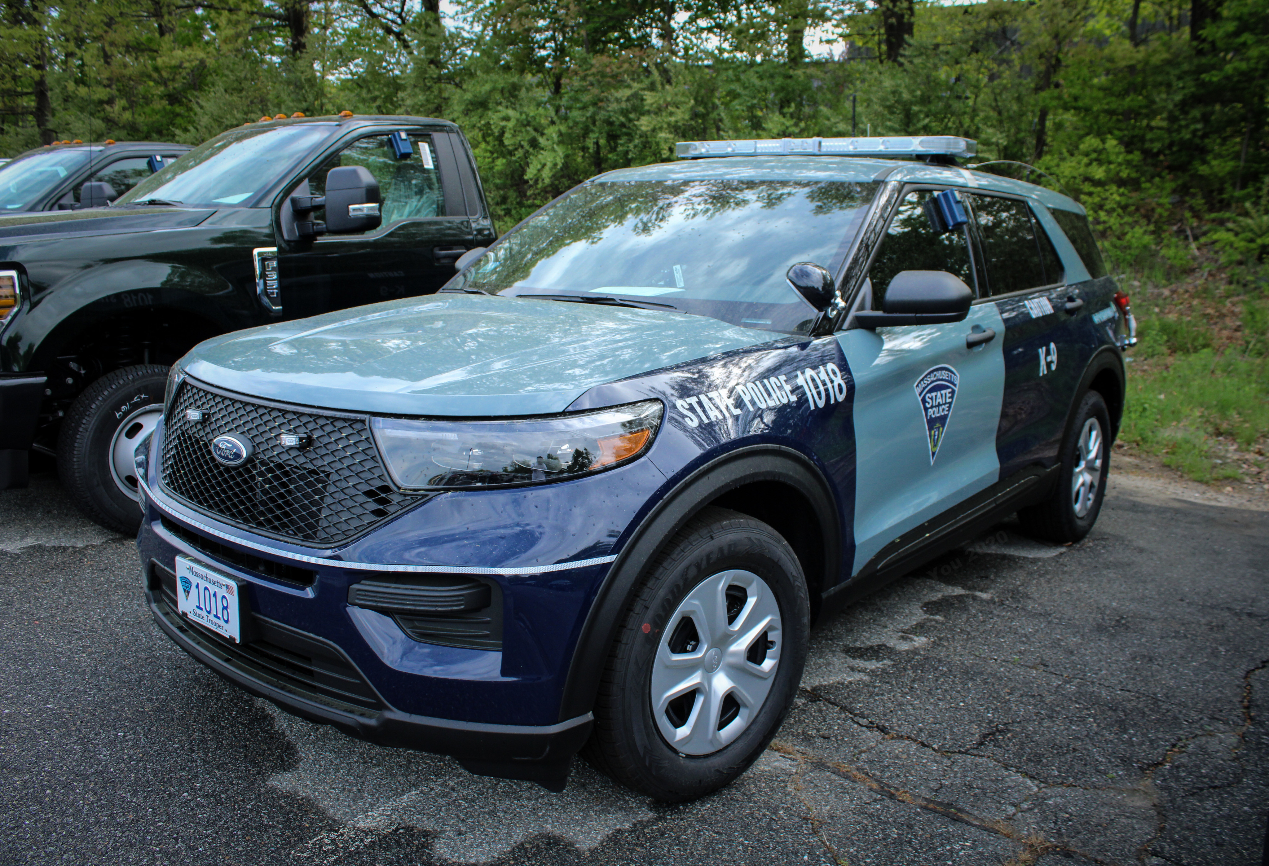 A photo  of Massachusetts State Police
            Cruiser 1018, a 2020 Ford Police Interceptor Utility Hybrid             taken by Nicholas You