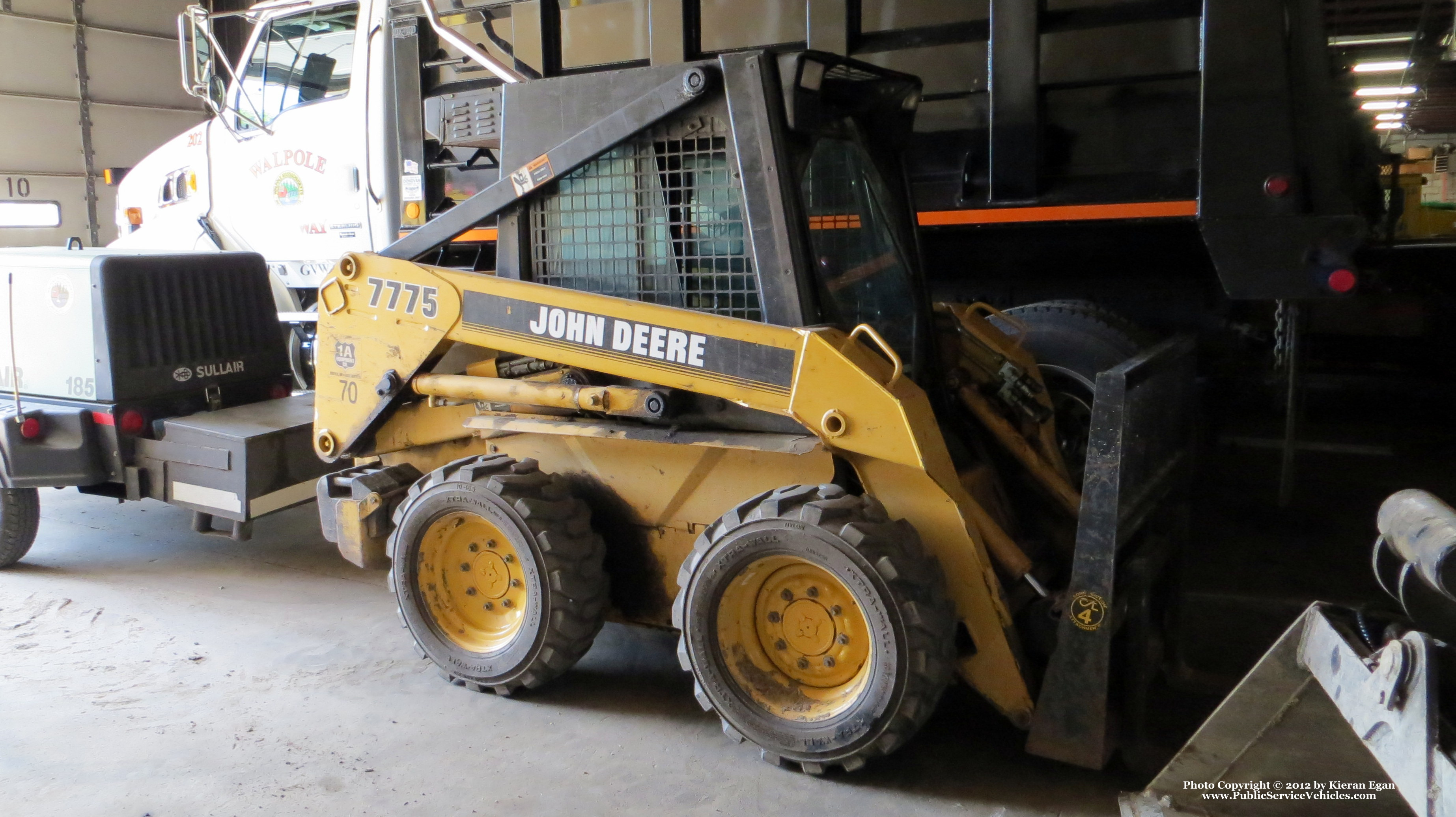 A photo  of Walpole Highway Department
            Skid Steer 270, a 1990-2010 John Deere 7775             taken by Kieran Egan