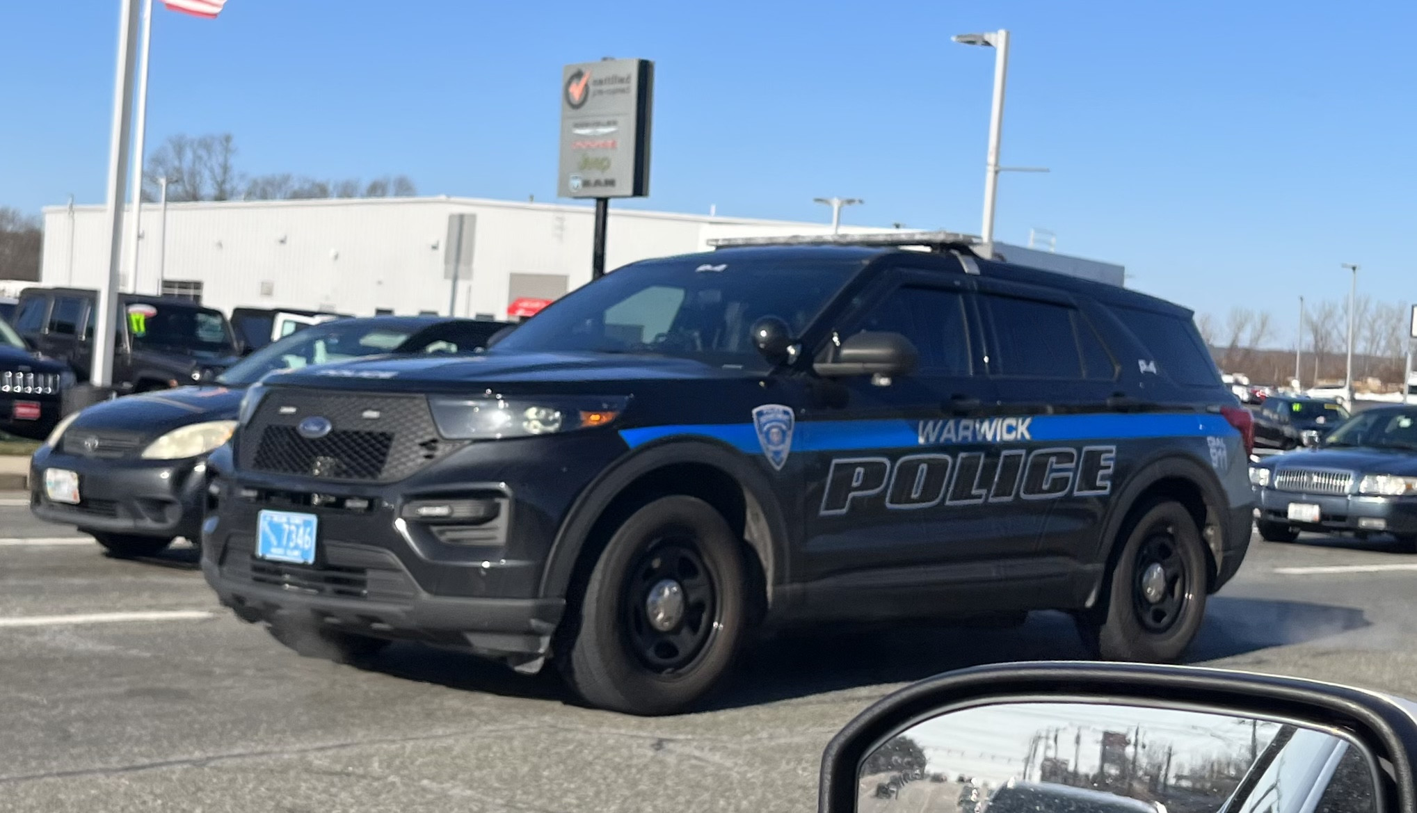 A photo  of Warwick Police
            Cruiser P-4, a 2021 Ford Police Interceptor Utility             taken by @riemergencyvehicles