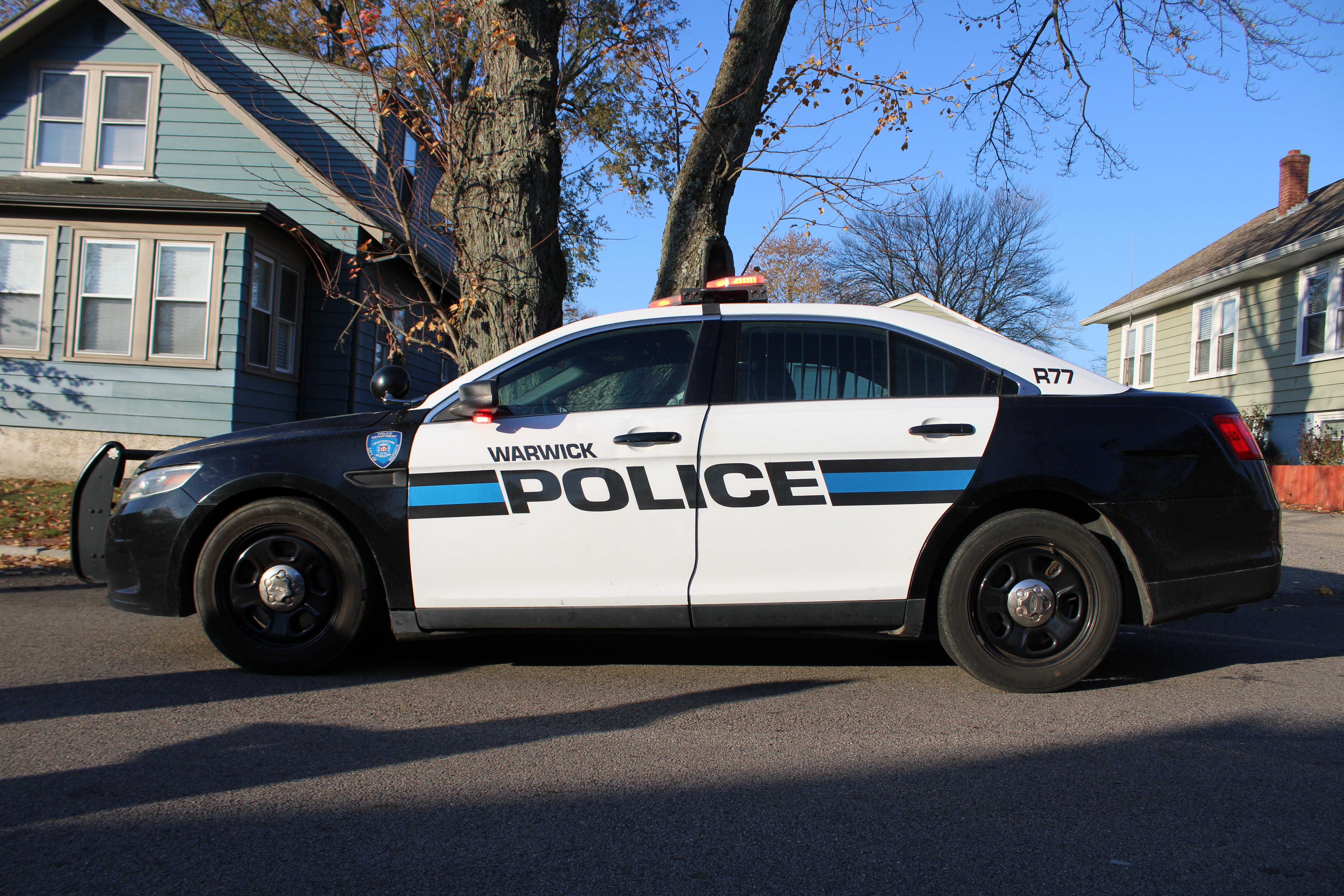 A photo  of Warwick Police
            Cruiser R-77, a 2015 Ford Police Interceptor Sedan             taken by @riemergencyvehicles