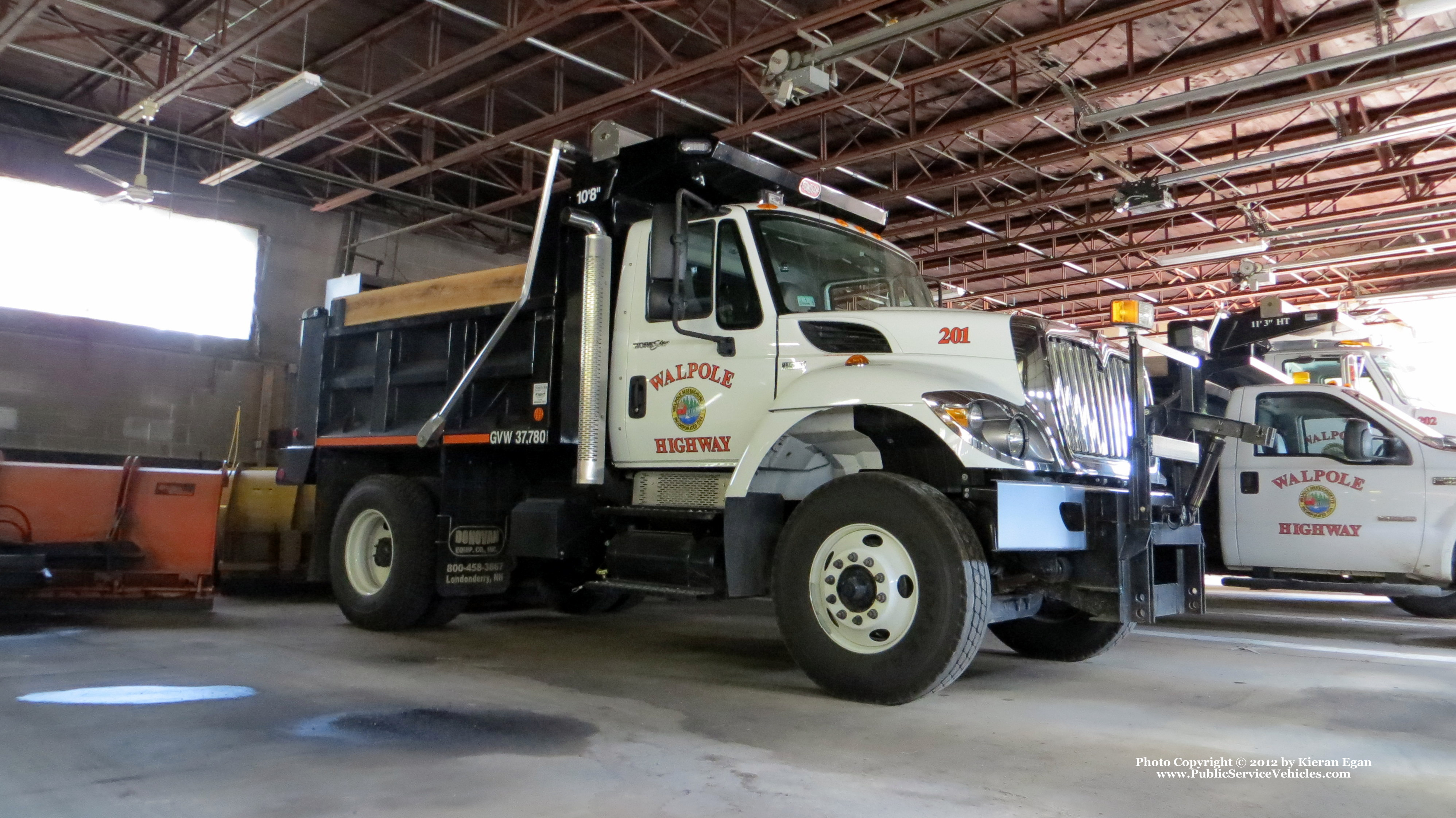 A photo  of Walpole Highway Department
            Truck 201, a 2012 International 7400/Heil             taken by Kieran Egan