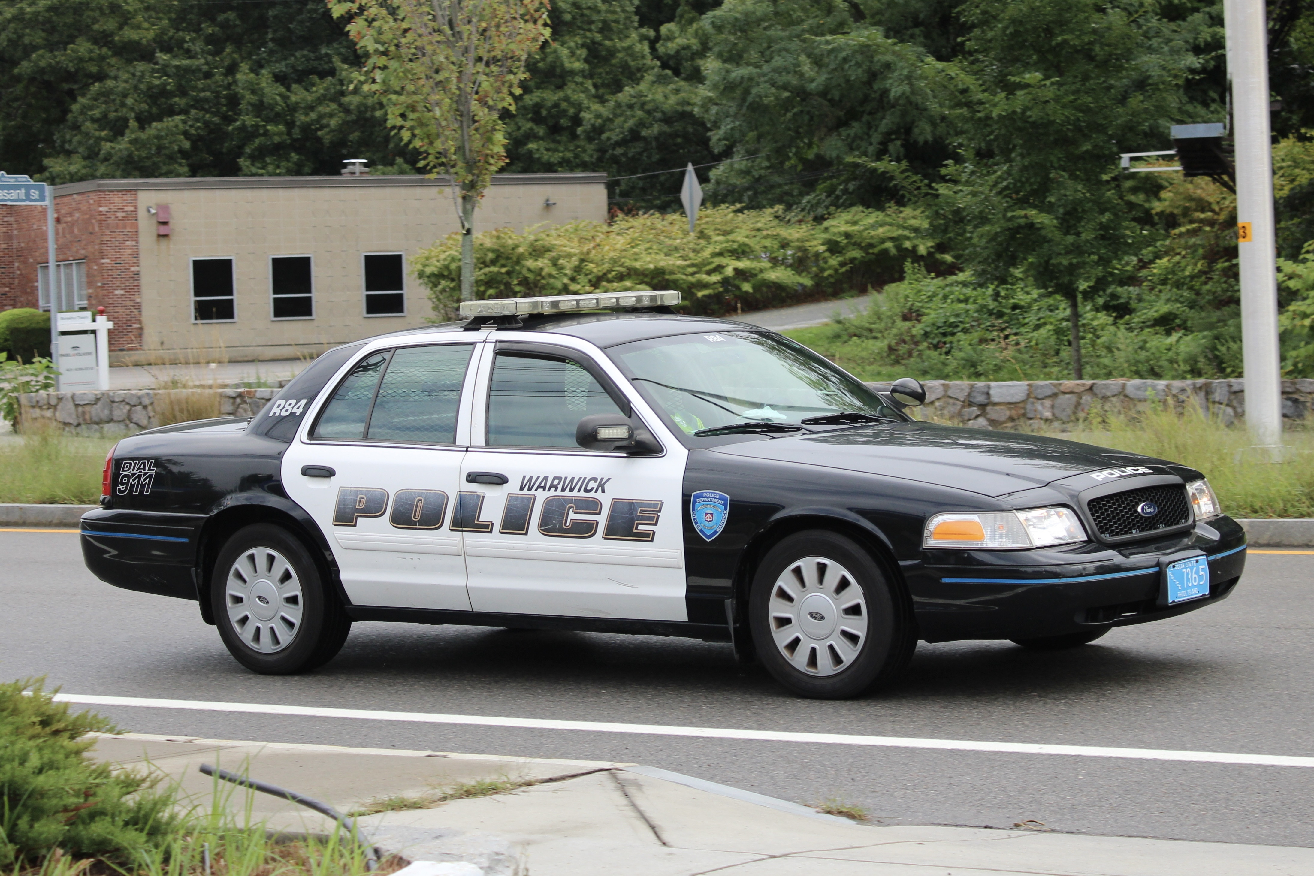 A photo  of Warwick Police
            Cruiser R-84, a 2011 Ford Crown Victoria Police Interceptor             taken by @riemergencyvehicles