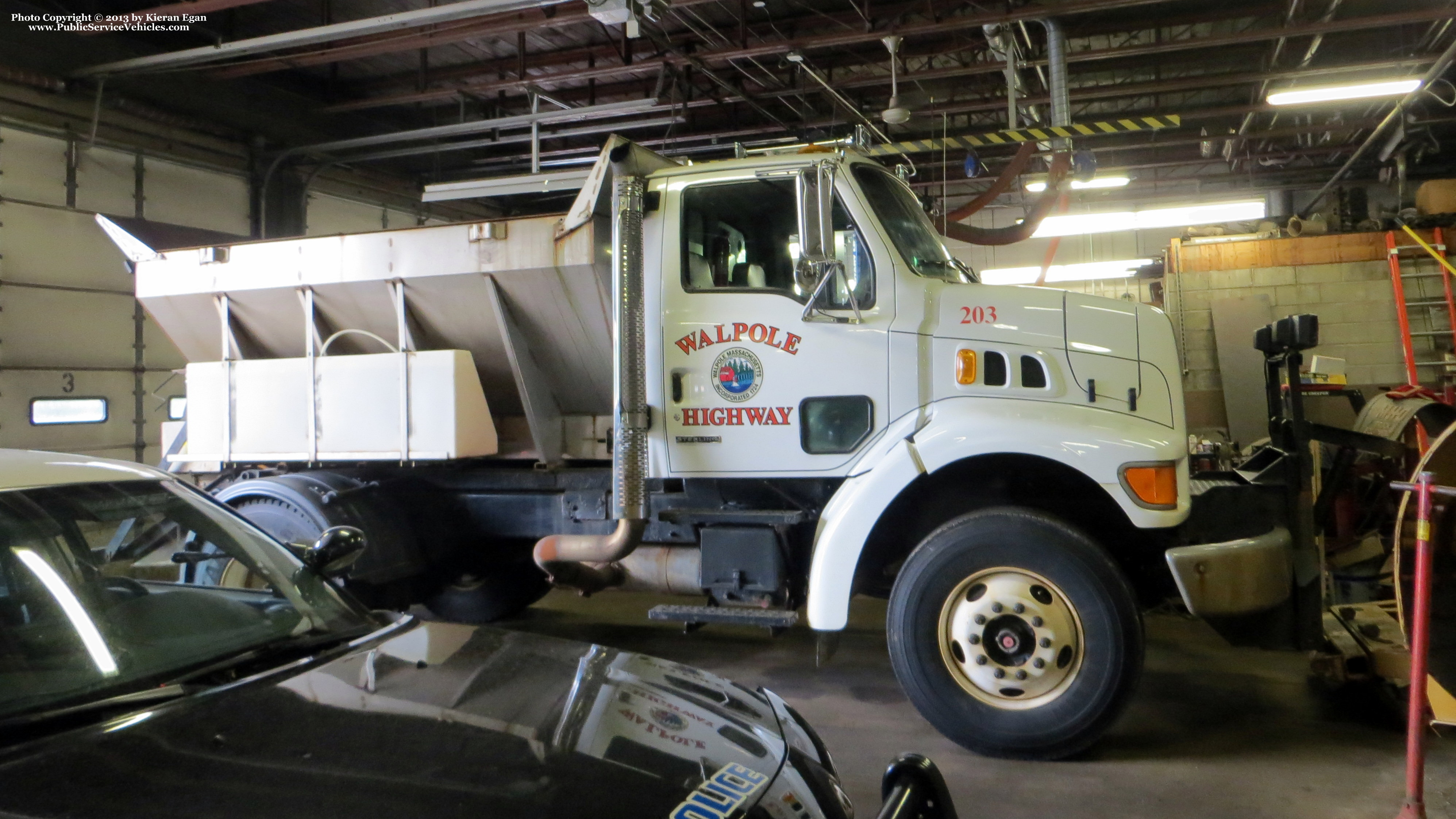 A photo  of Walpole Highway Department
            Truck 203, a 2001 Sterling L7500             taken by Kieran Egan