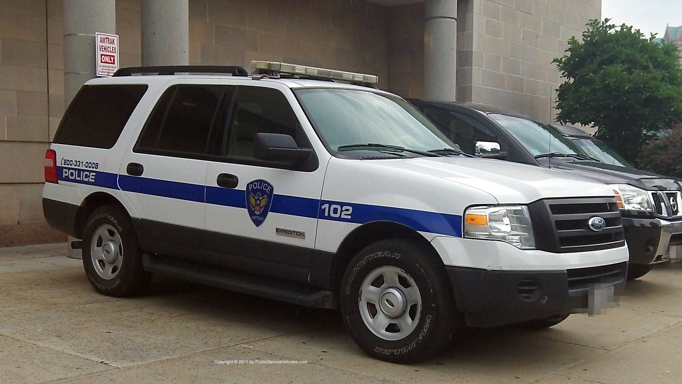 A photo  of Amtrak Police
            Cruiser 102, a 2007-2011 Ford Expedition             taken by Kieran Egan