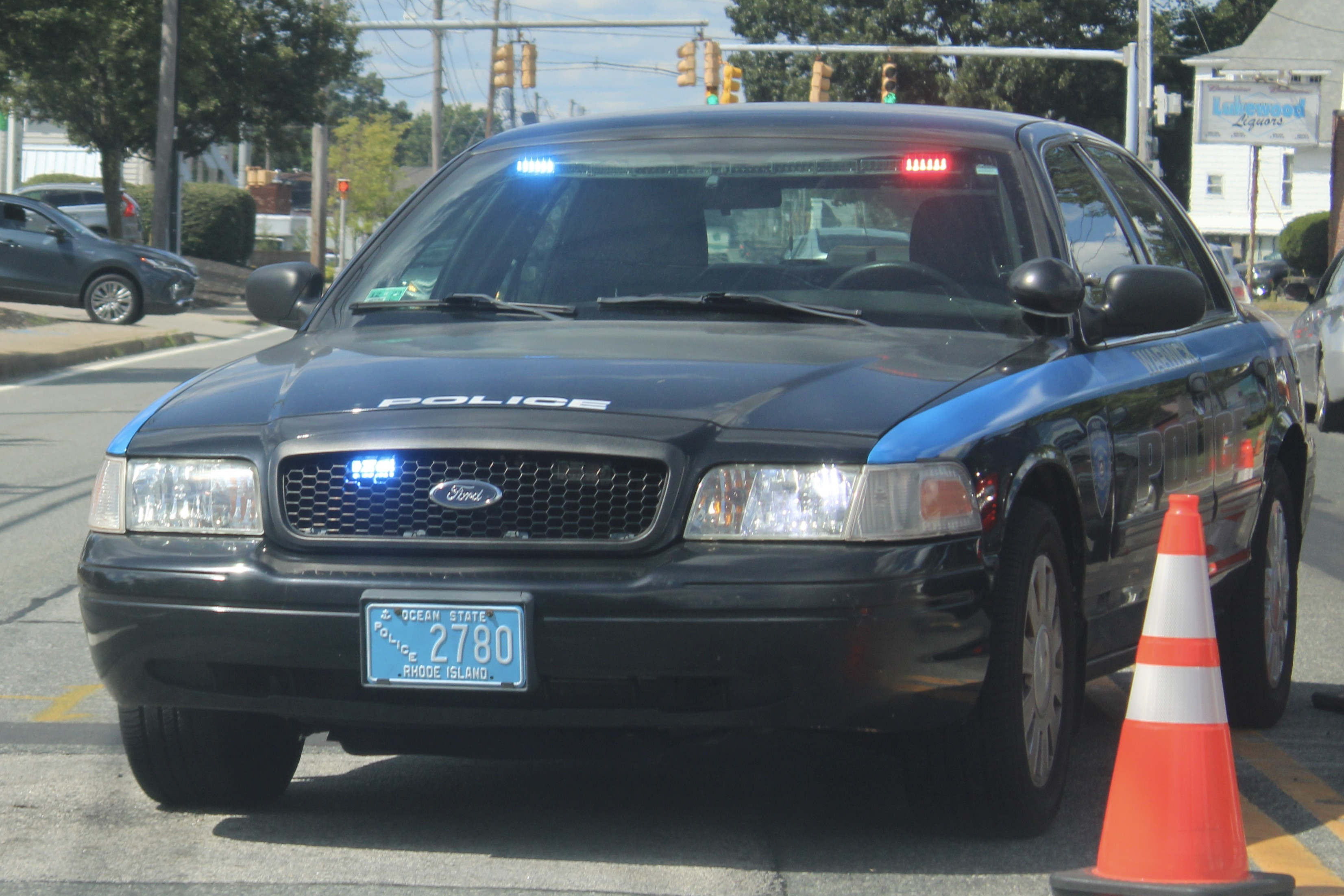 A photo  of Warwick Police
            Cruiser R-82, a 2009-2011 Ford Crown Victoria Police Interceptor             taken by @riemergencyvehicles