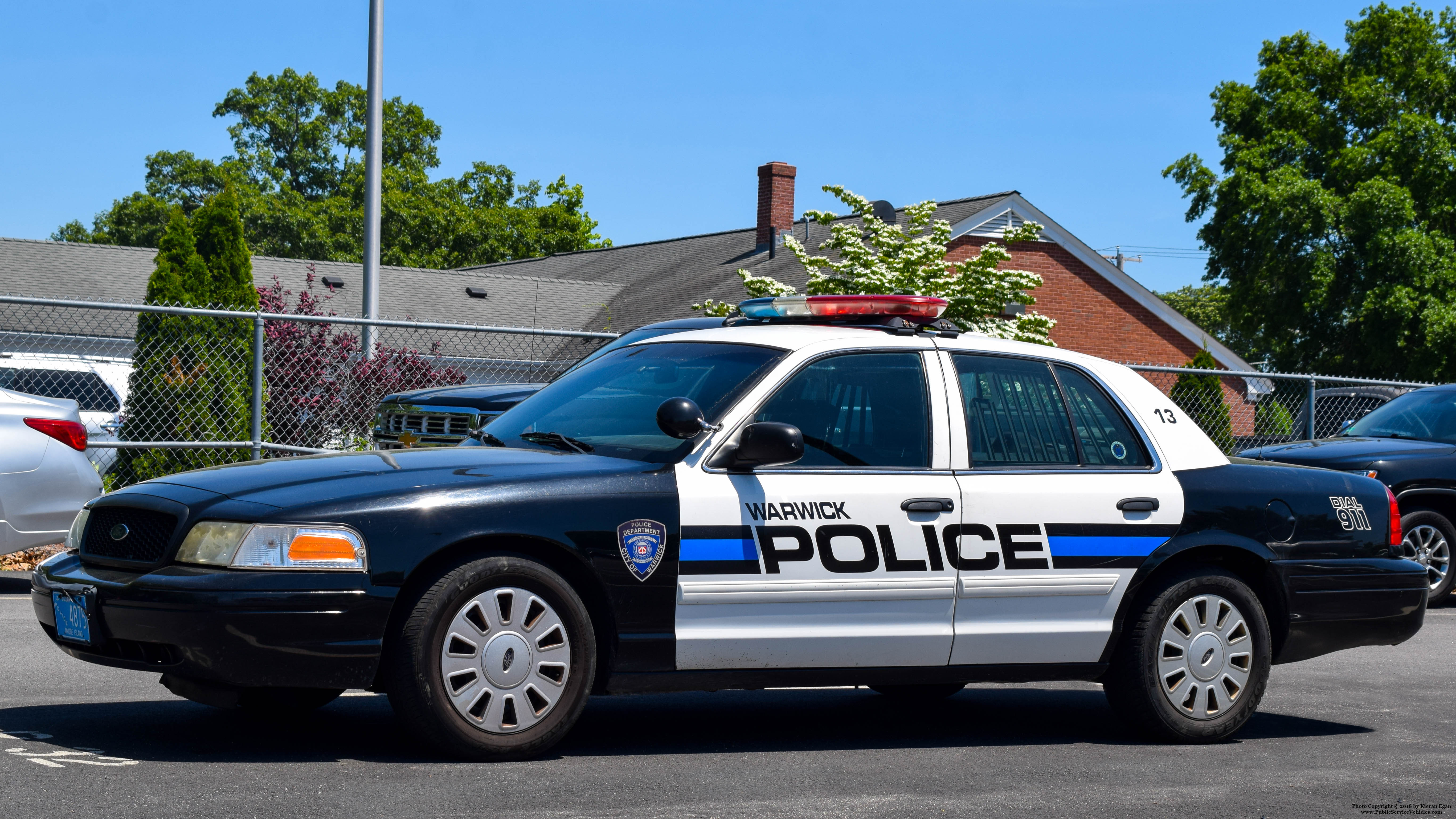 A photo  of Warwick Police
            Cruiser P-13, a 2009-2011 Ford Crown Victoria Police Interceptor             taken by Kieran Egan