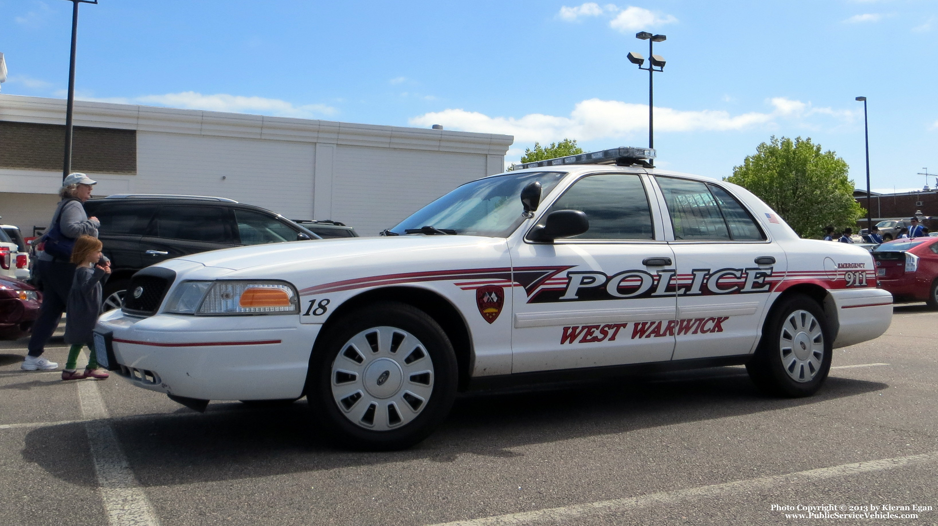 A photo  of West Warwick Police
            Car 18, a 2011 Ford Crown Victoria Police Interceptor             taken by Kieran Egan