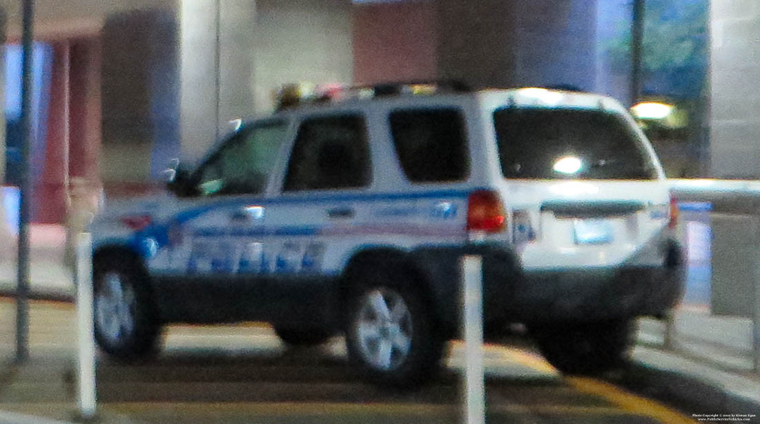 A photo  of Rhode Island Airport Police
            Cruiser 504, a 2001-2007 Ford Escape             taken by Kieran Egan