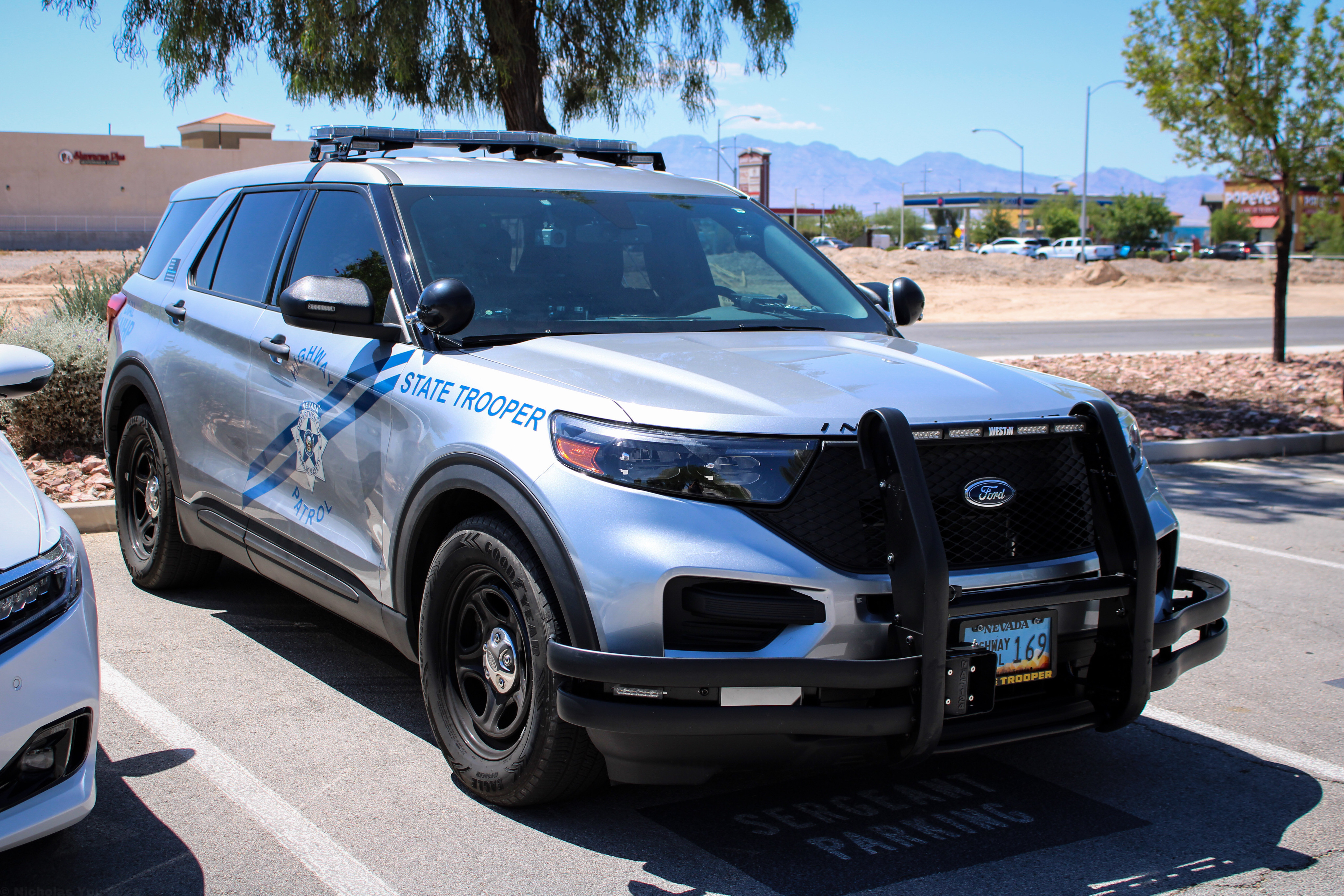 A photo  of Nevada State Police Highway Patrol
            Cruiser 169, a 2020-2021 Ford Police Interceptor Utility             taken by Nicholas You