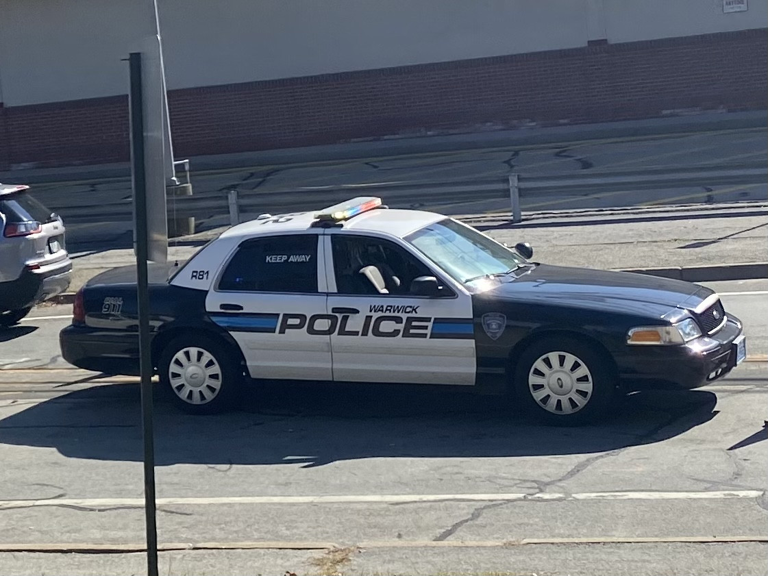 A photo  of Warwick Police
            Cruiser R-81, a 2009-2011 Ford Crown Victoria Police Interceptor             taken by @riemergencyvehicles