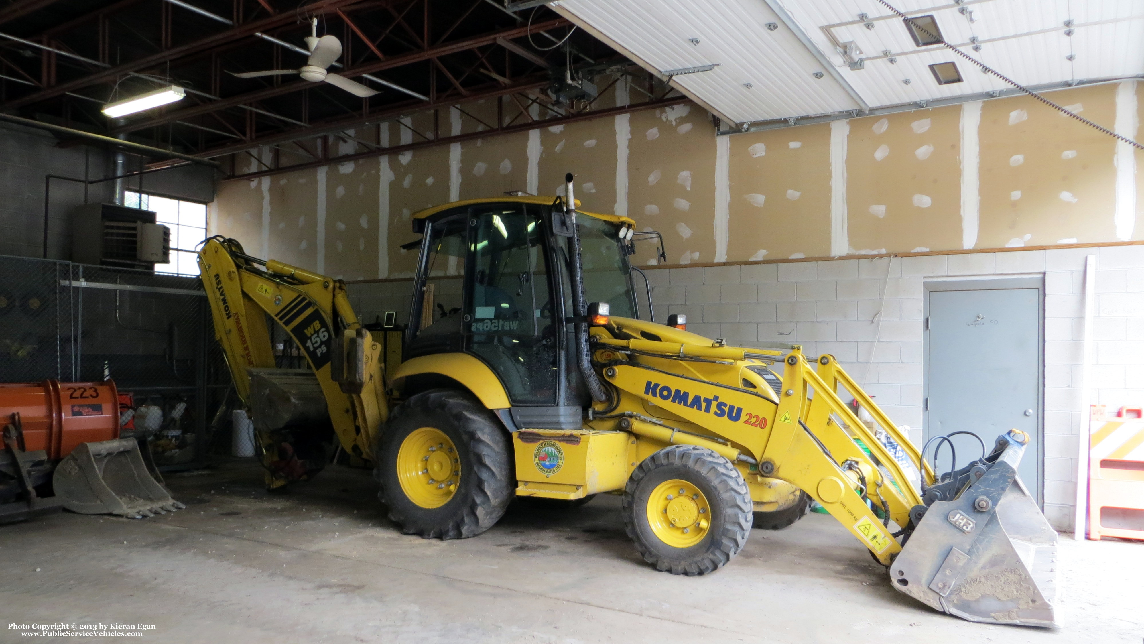 A photo  of Walpole Highway Department
            Backhoe 220, a 2009 Komatsu WB156             taken by Kieran Egan