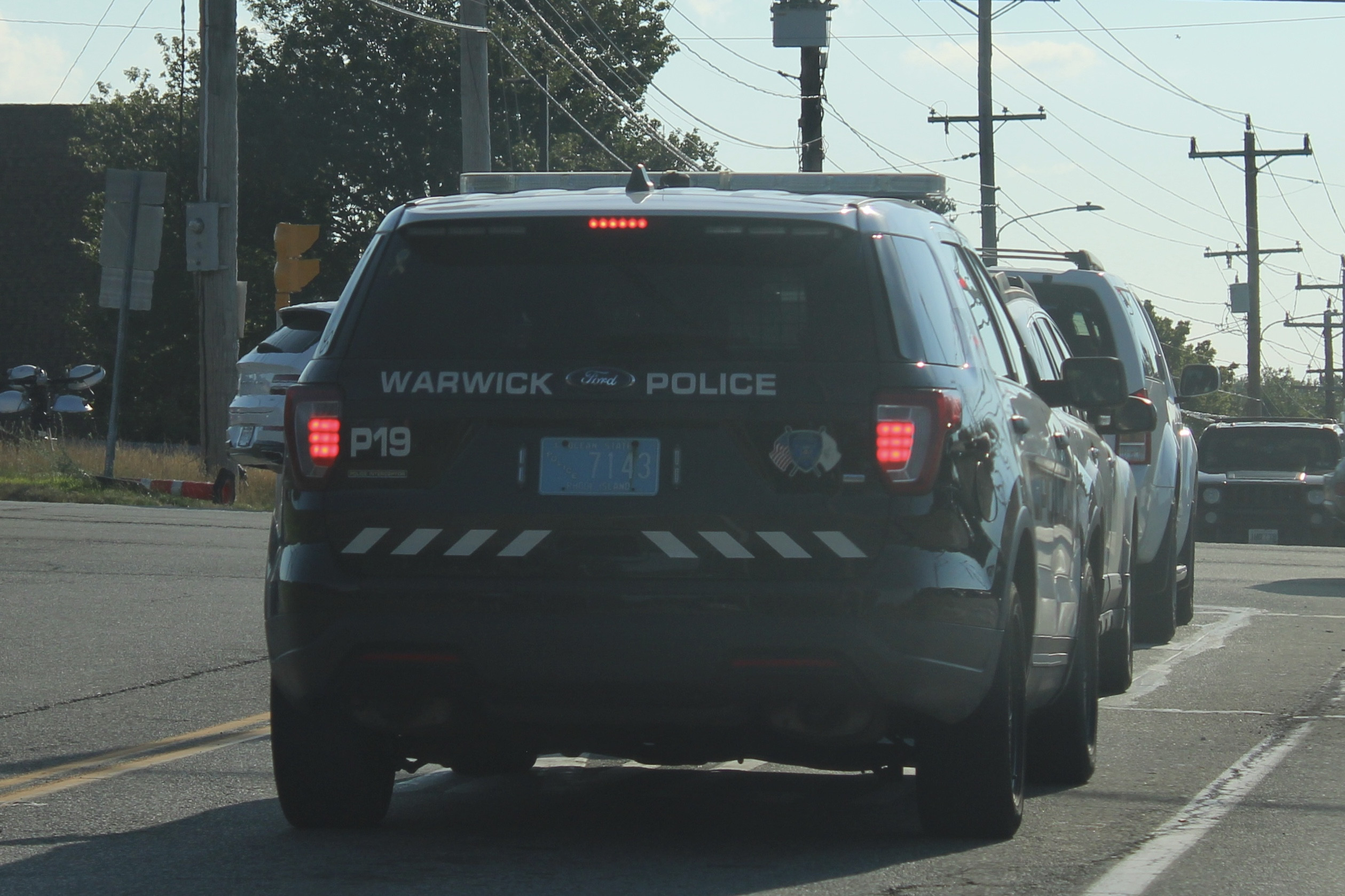 A photo  of Warwick Police
            Cruiser P-19, a 2019 Ford Police Interceptor Utility             taken by @riemergencyvehicles