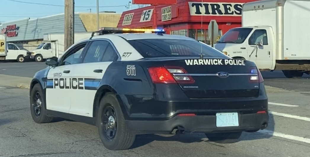 A photo  of Warwick Police
            Cruiser R-77, a 2015 Ford Police Interceptor Sedan             taken by @riemergencyvehicles