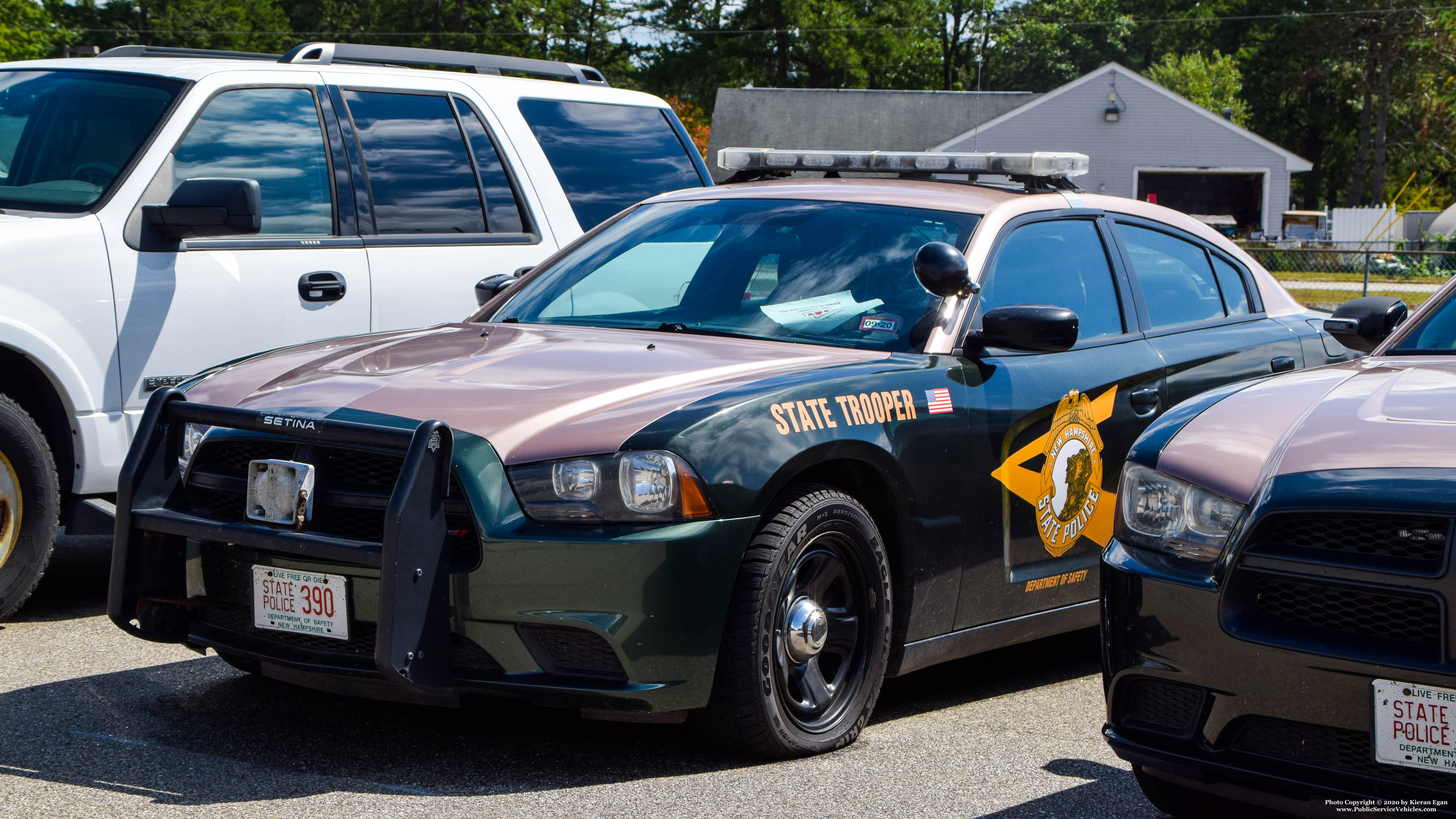 A photo  of New Hampshire State Police
            Cruiser 390, a 2011-2014 Dodge Charger             taken by Kieran Egan
