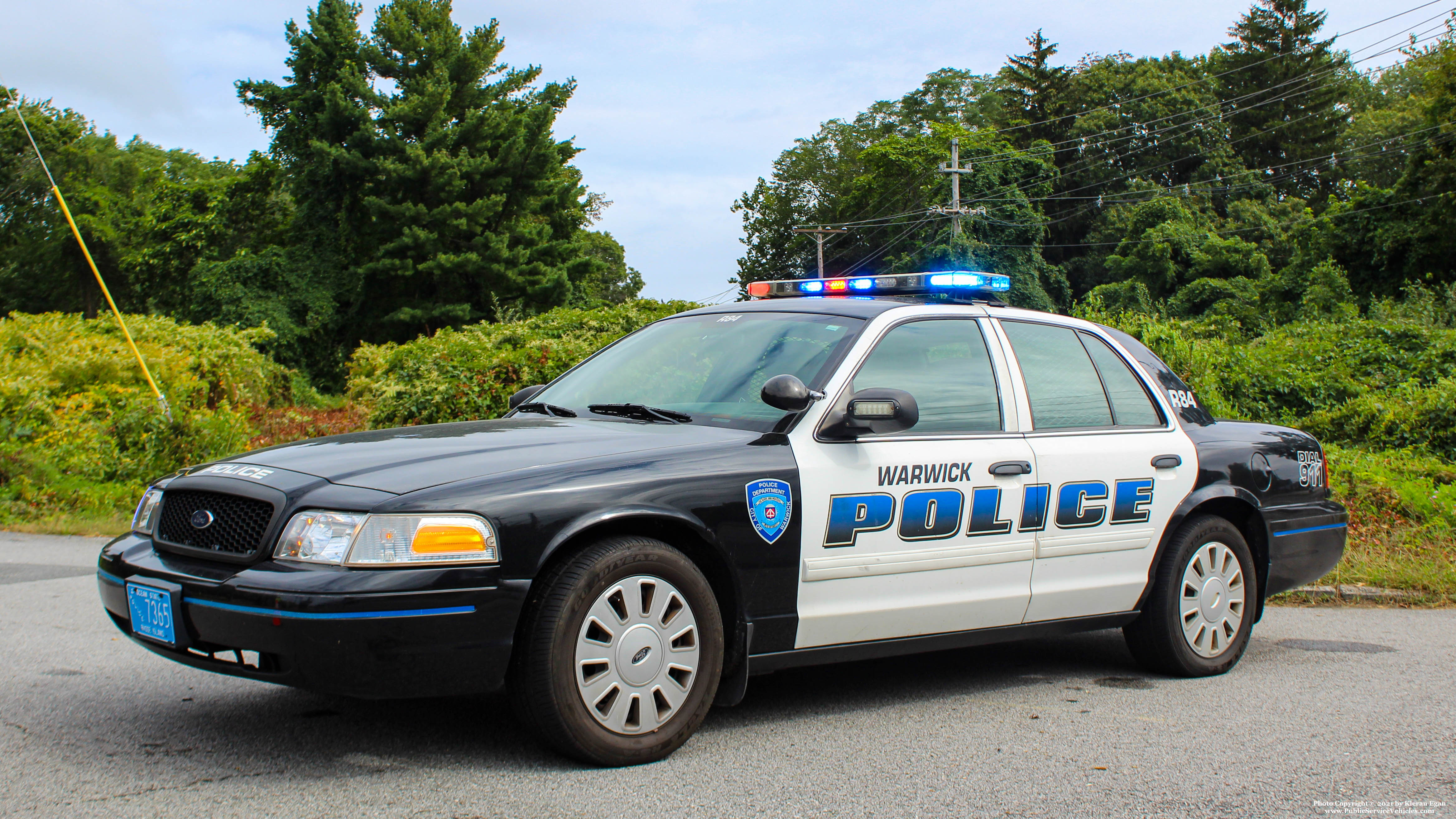 A photo  of Warwick Police
            Cruiser R-84, a 2011 Ford Crown Victoria Police Interceptor             taken by Kieran Egan