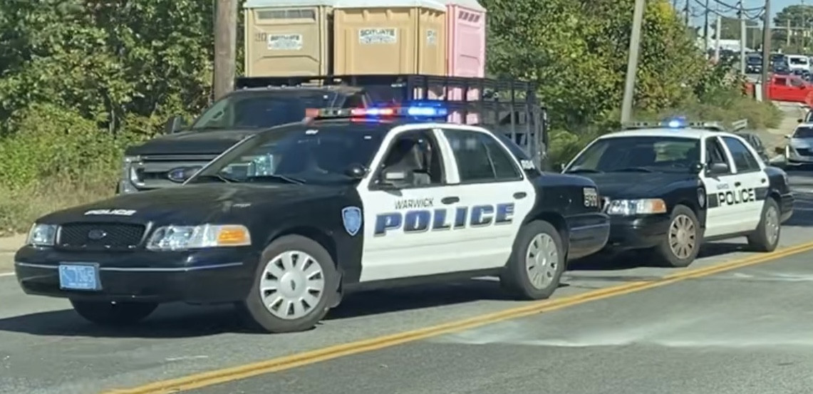 A photo  of Warwick Police
            Cruiser R-84, a 2011 Ford Crown Victoria Police Interceptor             taken by @riemergencyvehicles